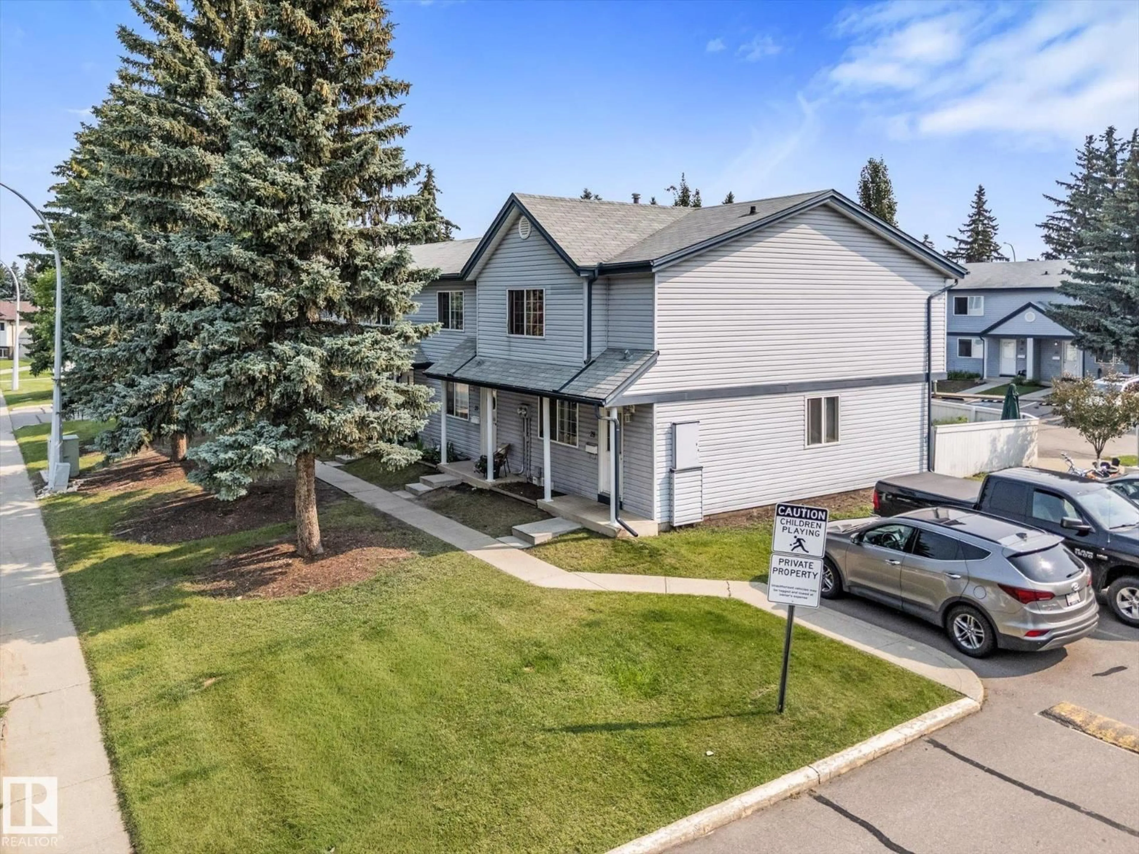 A pic from outside/outdoor area/front of a property/back of a property/a pic from drone, street for 100 - 26 WESTRIDGE CR, Spruce Grove Alberta T7X1R5