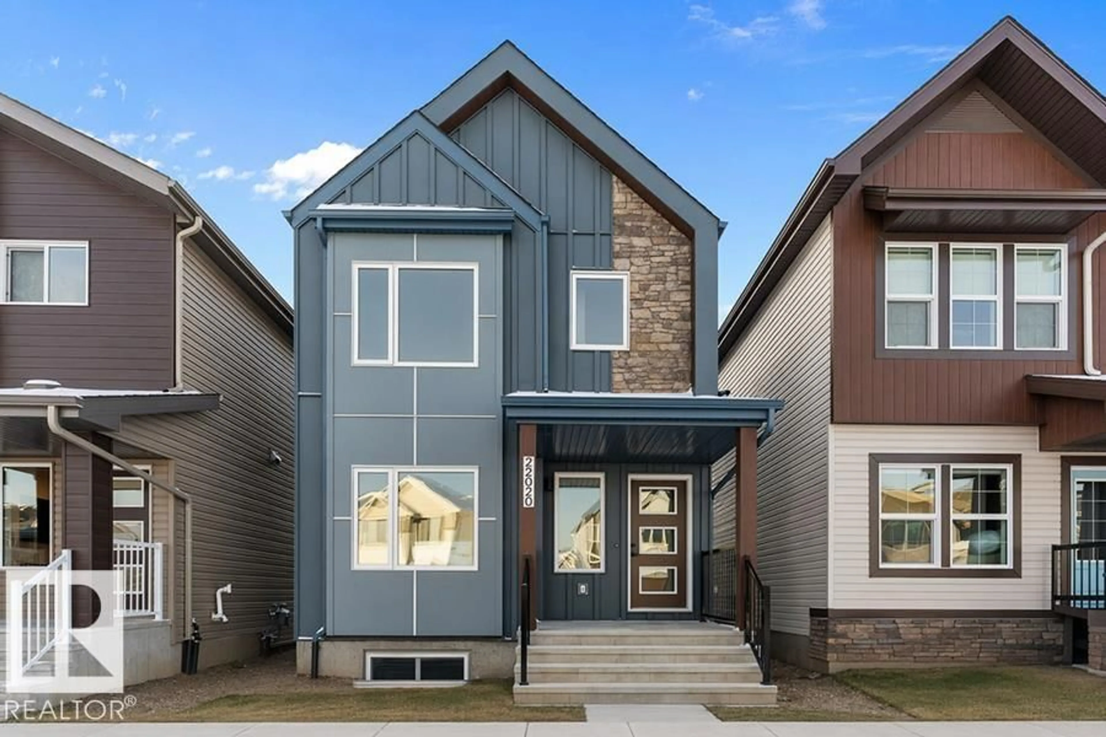 Home with vinyl exterior material, street for NW - 2020 191 ST, Edmonton Alberta T6M3E8