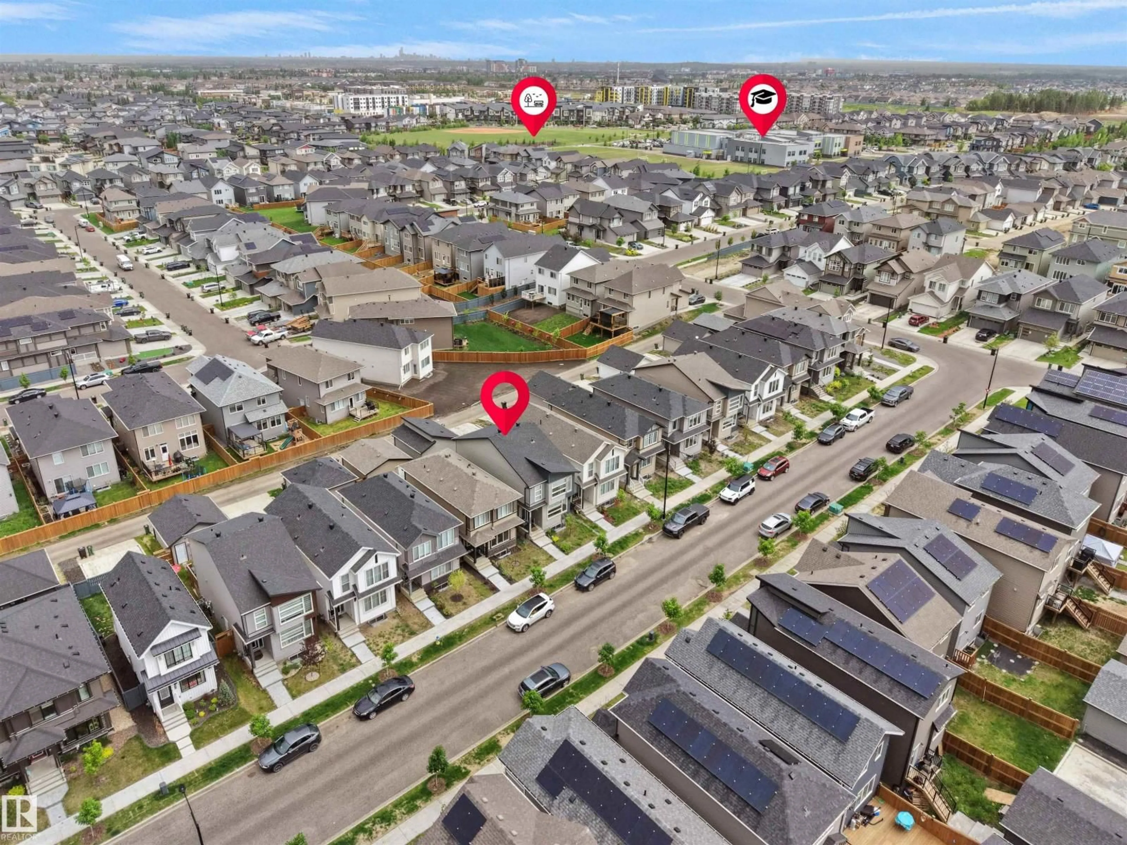 A pic from outside/outdoor area/front of a property/back of a property/a pic from drone, street for 5022 KINNEY LINK SW, Edmonton Alberta T6W5G4