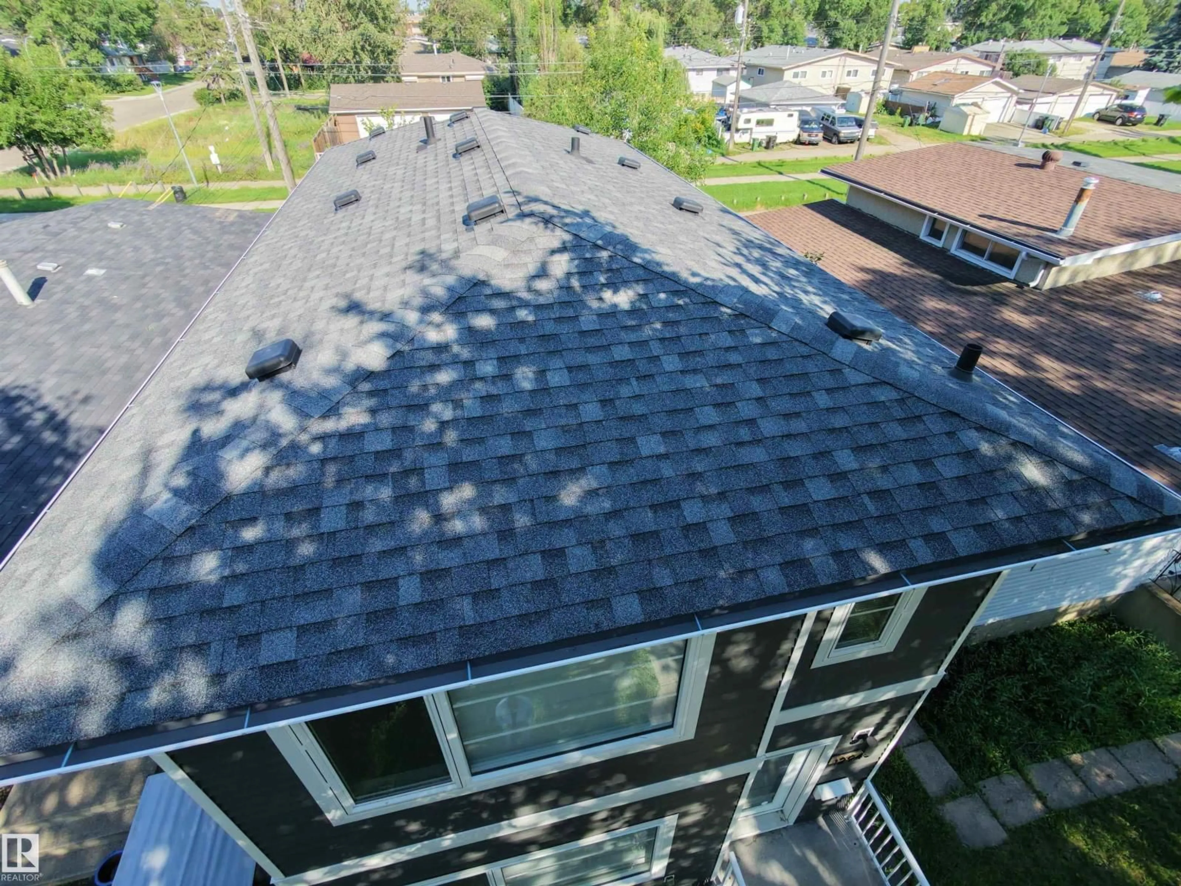 Home with vinyl exterior material, street for 13309 104 ST, Edmonton Alberta T5E4P2