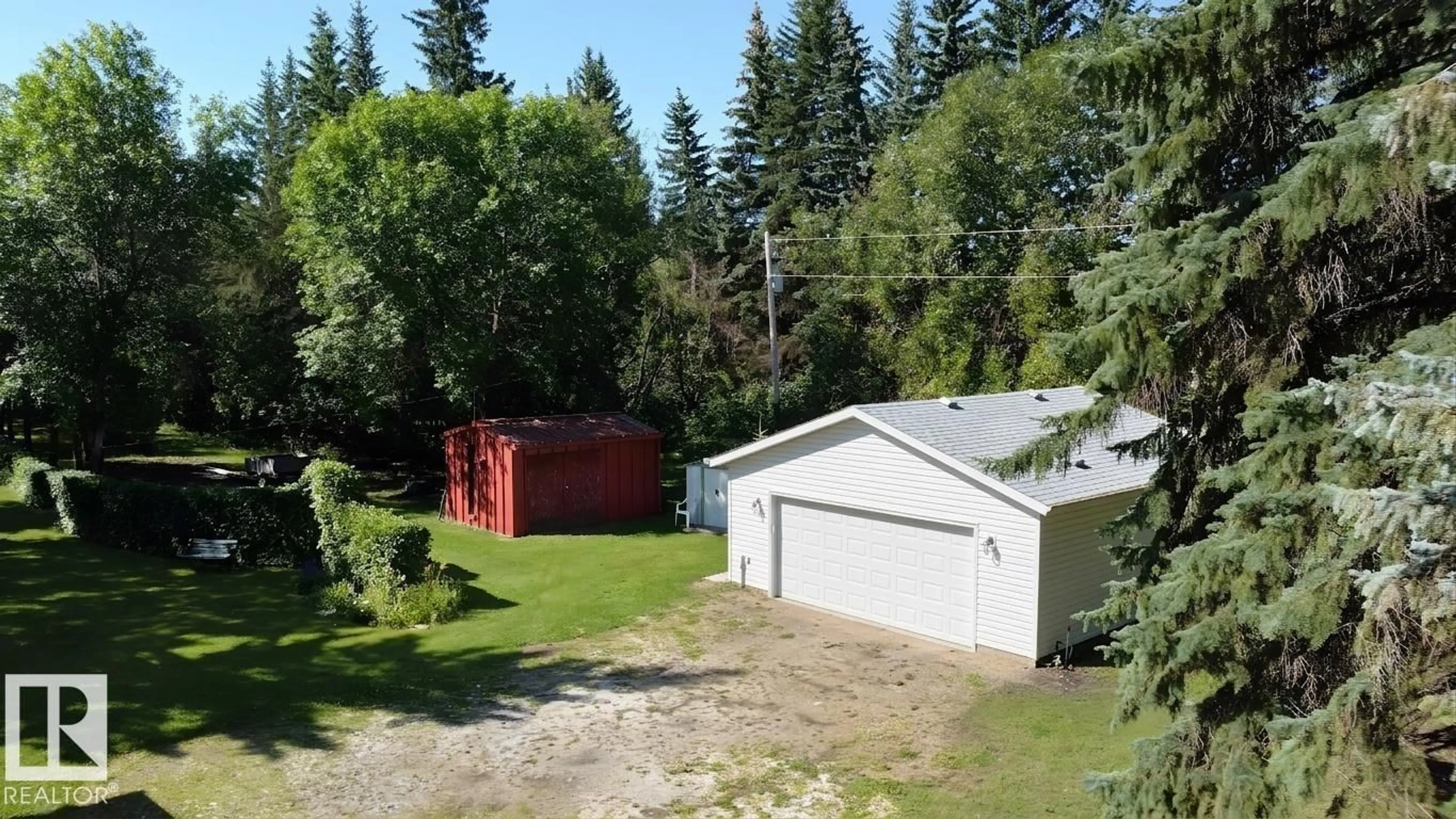 A pic from outside/outdoor area/front of a property/back of a property/a pic from drone, unknown for 5 - 54015 RGE ROAD 262, Rural Sturgeon County Alberta T8T0A4