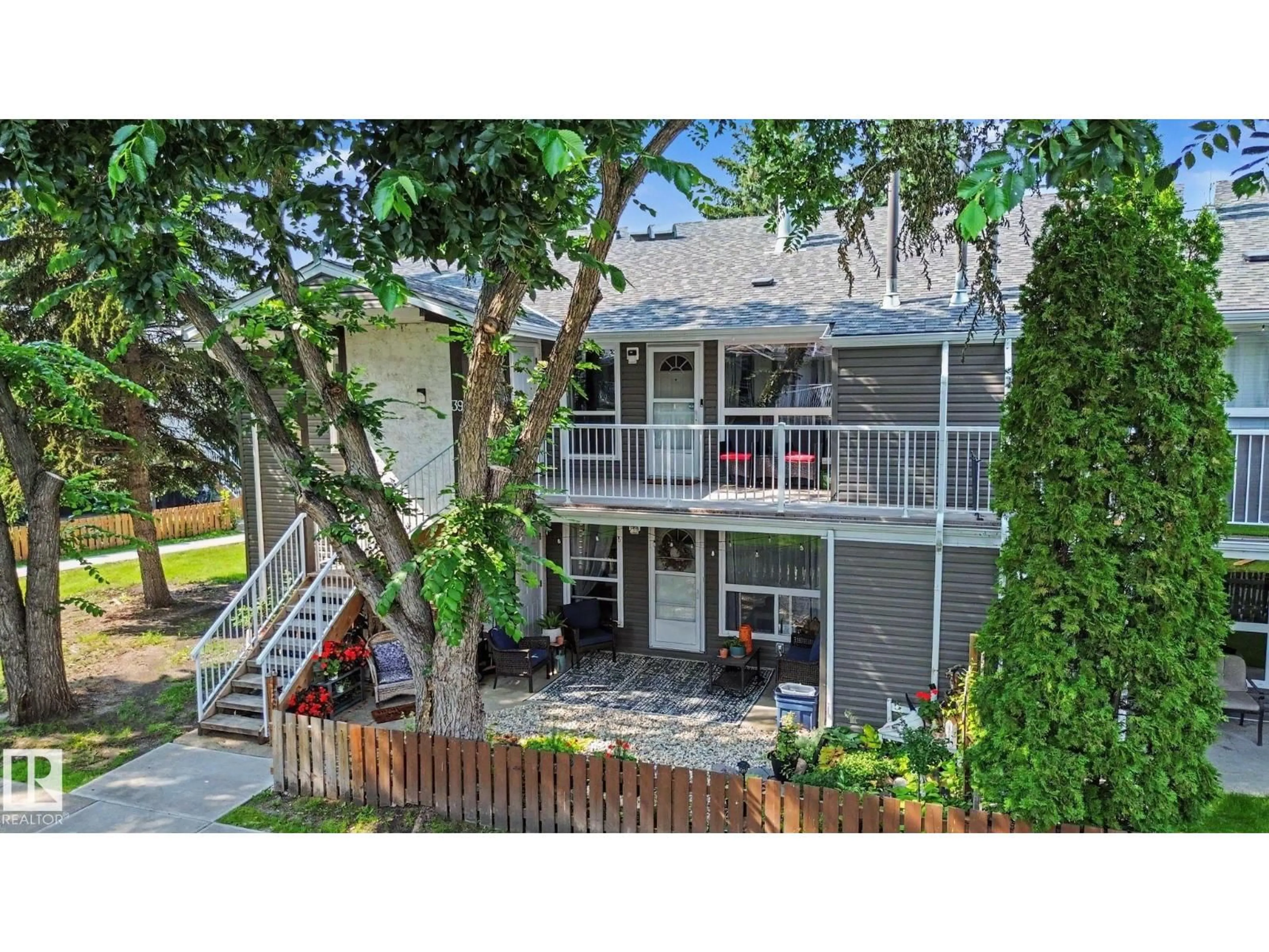 A pic from outside/outdoor area/front of a property/back of a property/a pic from drone, unknown for 39 - 3111 142 AV NW, Edmonton Alberta T5Y2H6