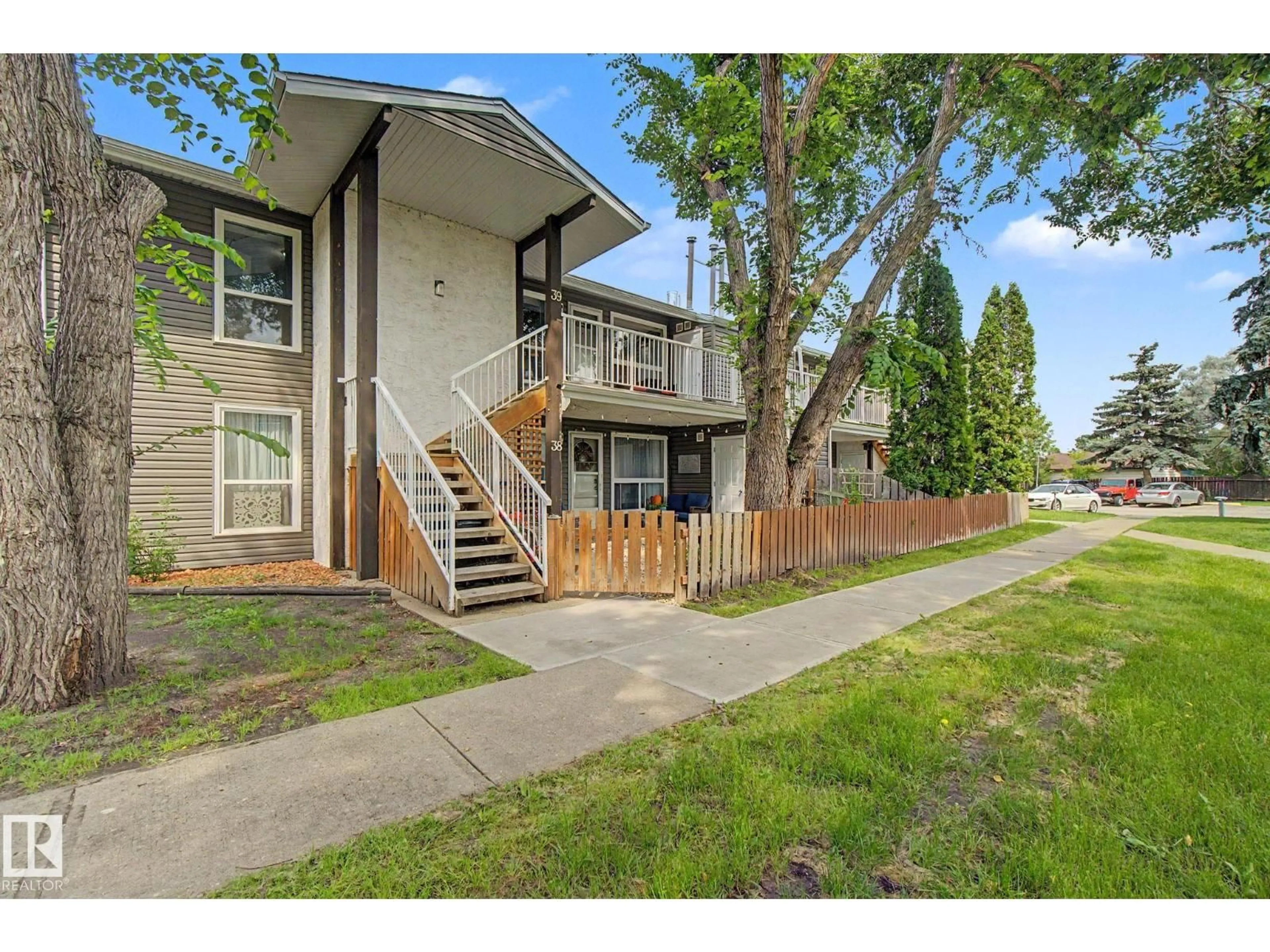 A pic from outside/outdoor area/front of a property/back of a property/a pic from drone, street for 39 - 3111 142 AV NW, Edmonton Alberta T5Y2H6