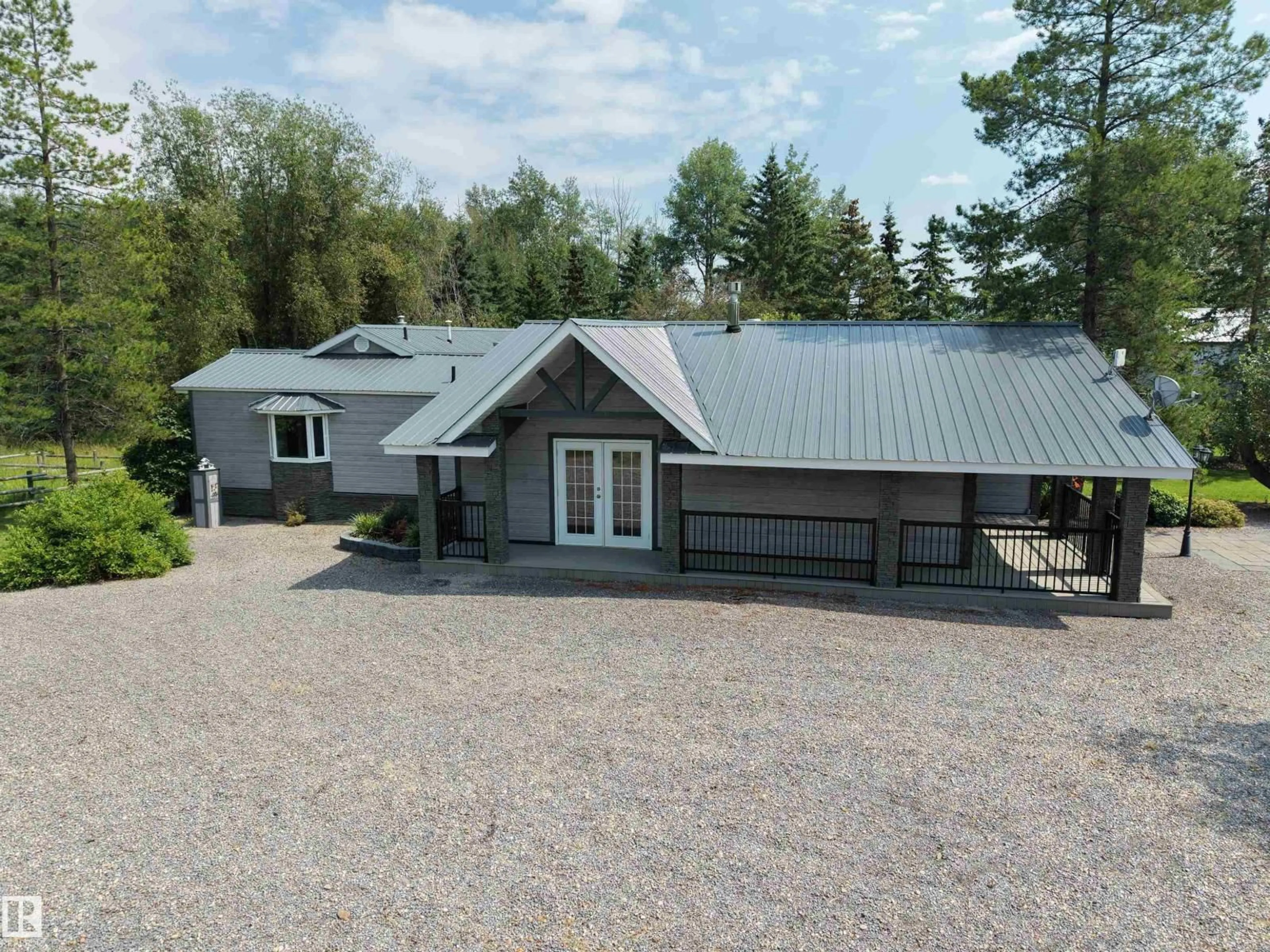 A pic from outside/outdoor area/front of a property/back of a property/a pic from drone, building for 70037 HWY 13, Rural Wetaskiwin County Alberta T0C0A0