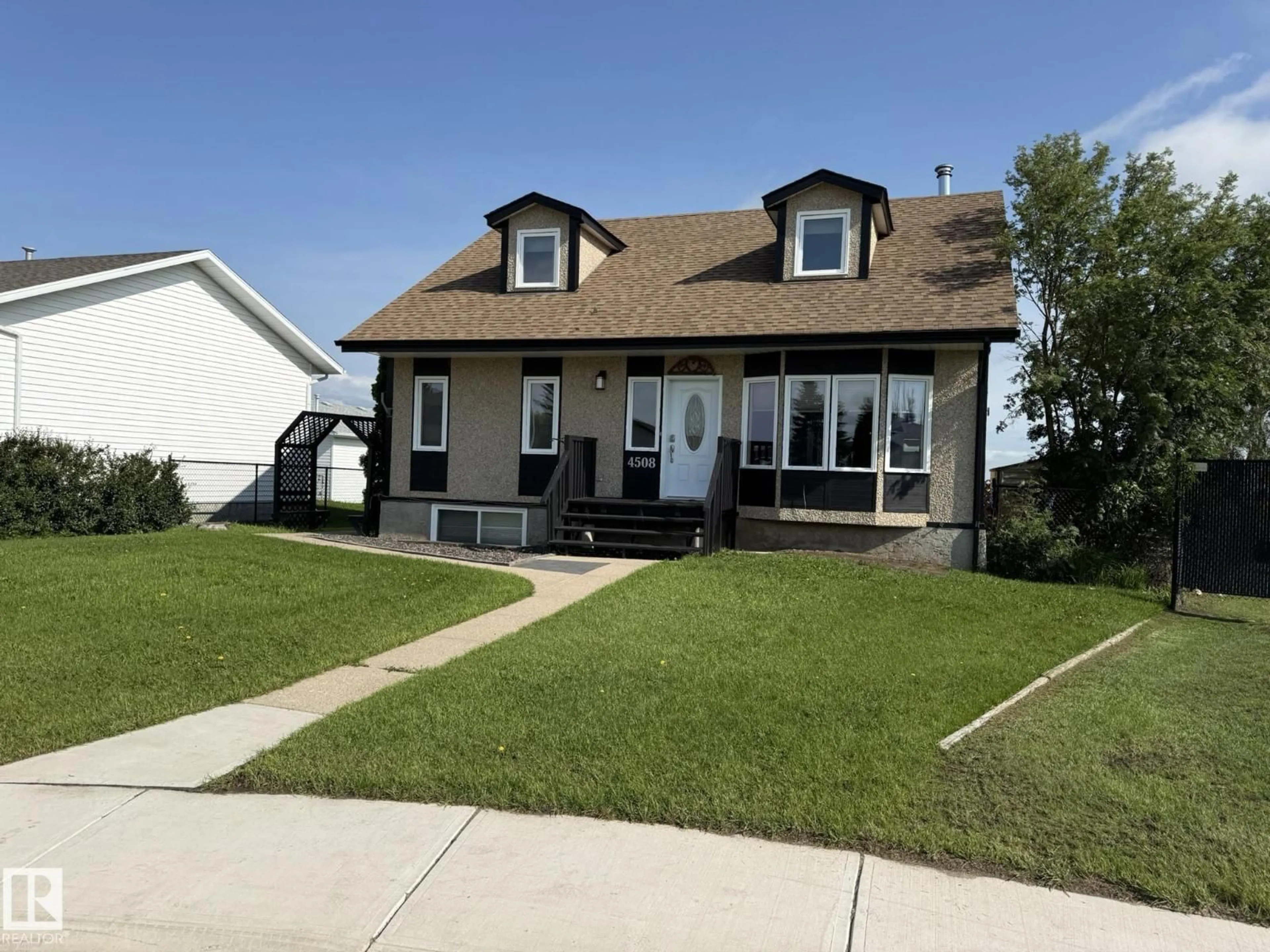 Home with vinyl exterior material, street for 4508 57 AV, Lamont Alberta T0B2R0
