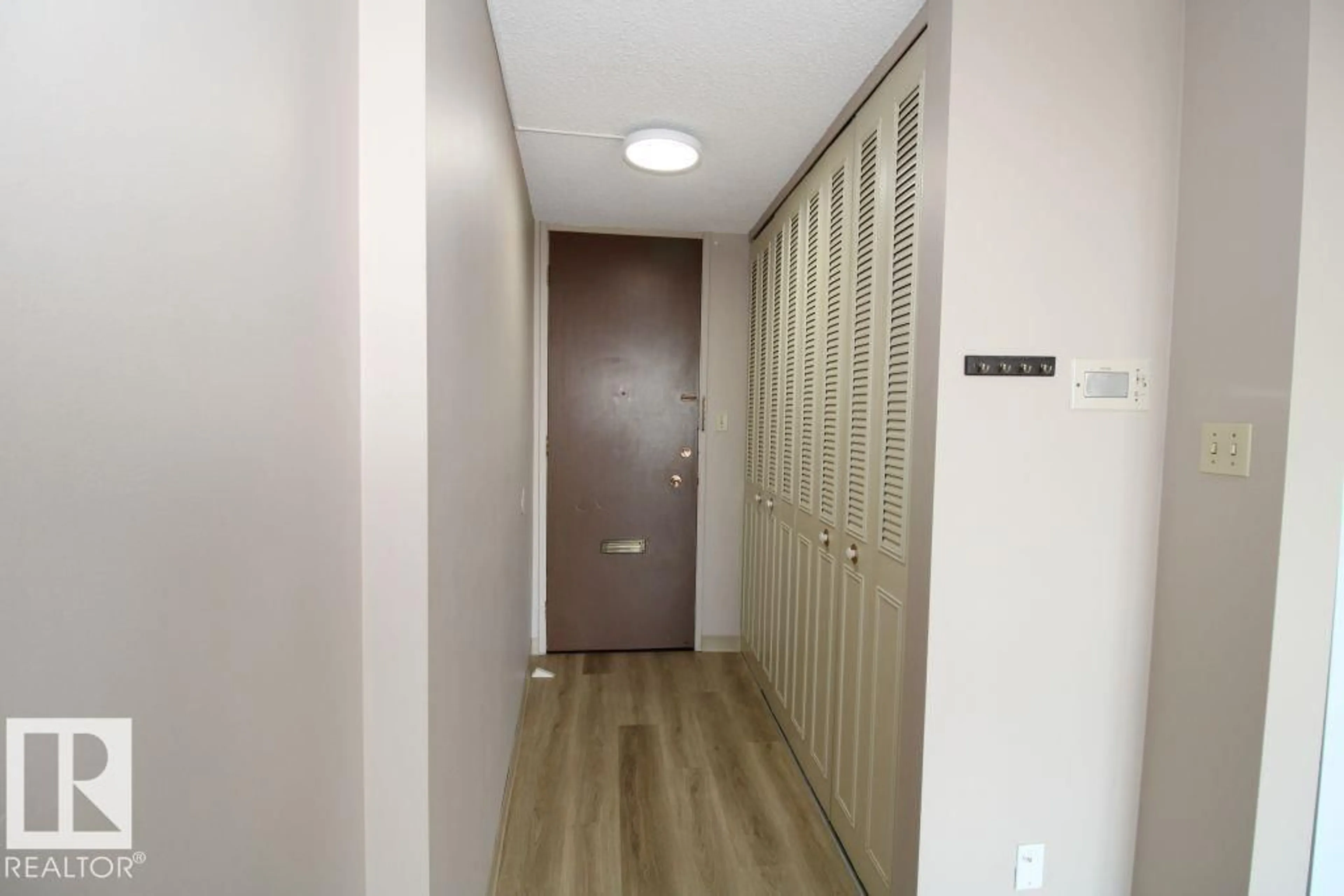 Indoor foyer for #408 - 10883 SASKATCHEWAN DR, Edmonton Alberta T6E4S6