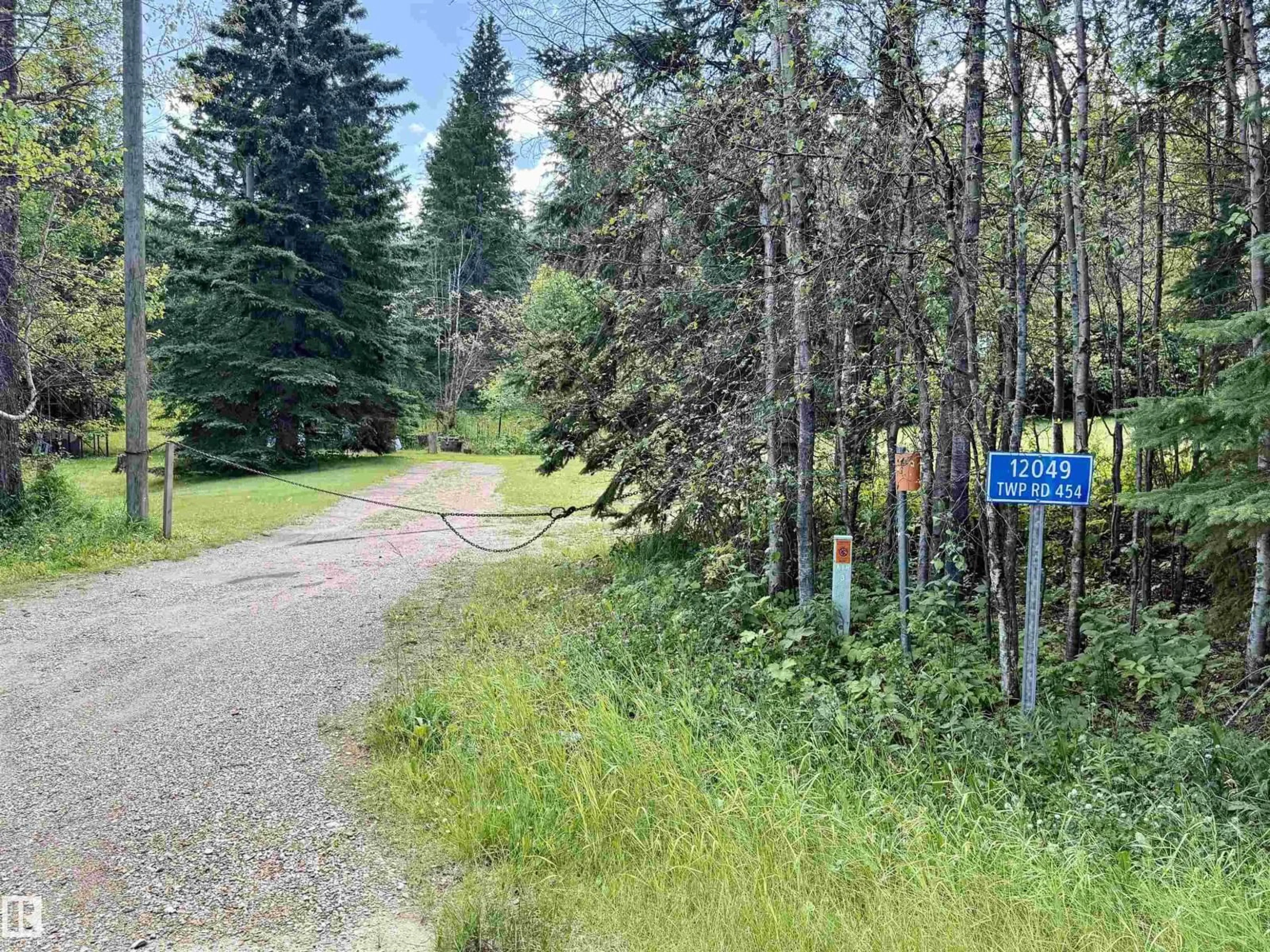 A pic from outside/outdoor area/front of a property/back of a property/a pic from drone, forest/trees view for 12049 TWP ROAD 454, Rural Wetaskiwin County Alberta T0C2V0