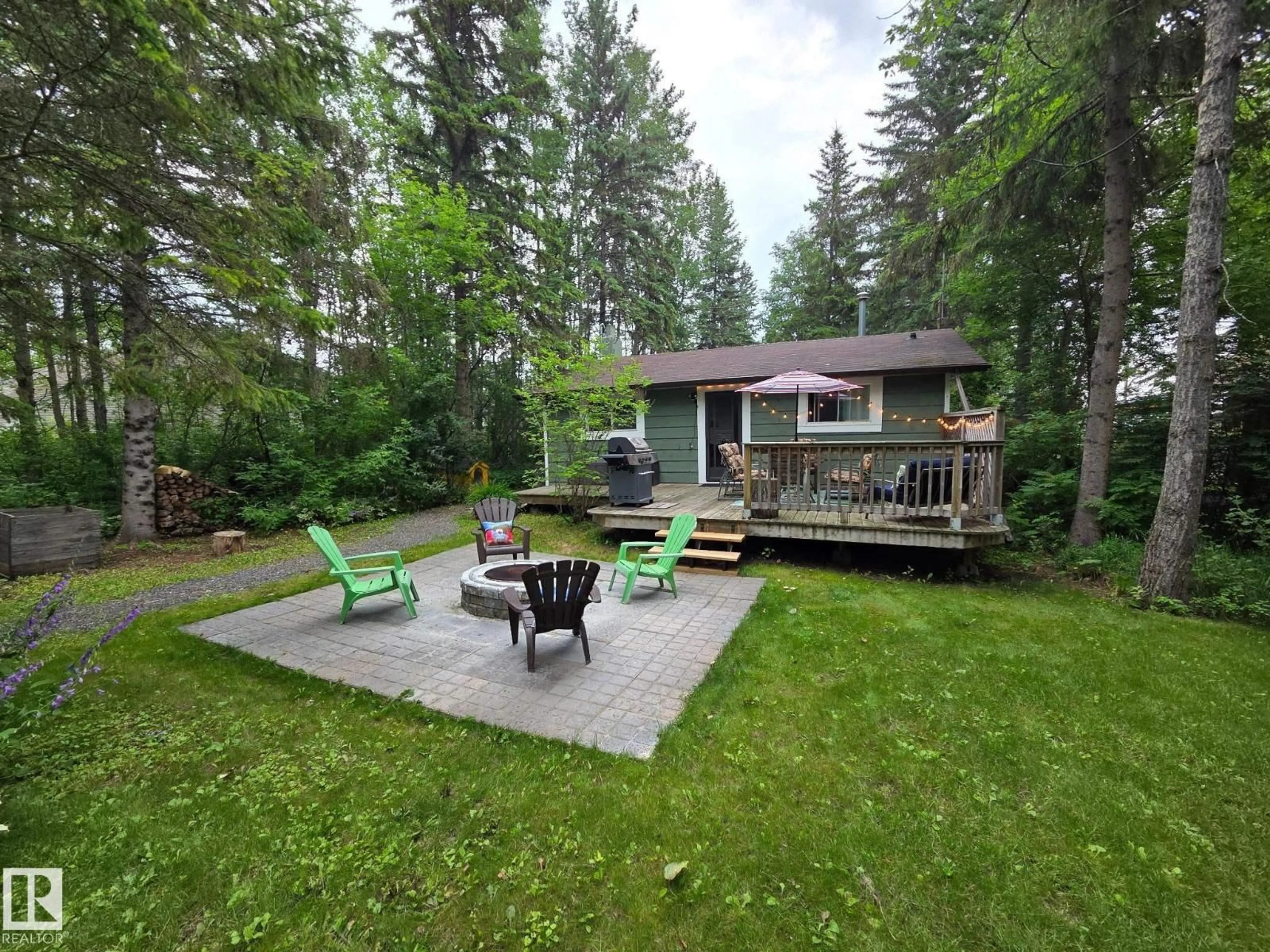 Patio, forest/trees view for 137 CRYSTAL SPRINGS DR, Rural Wetaskiwin County Alberta T0C2V0