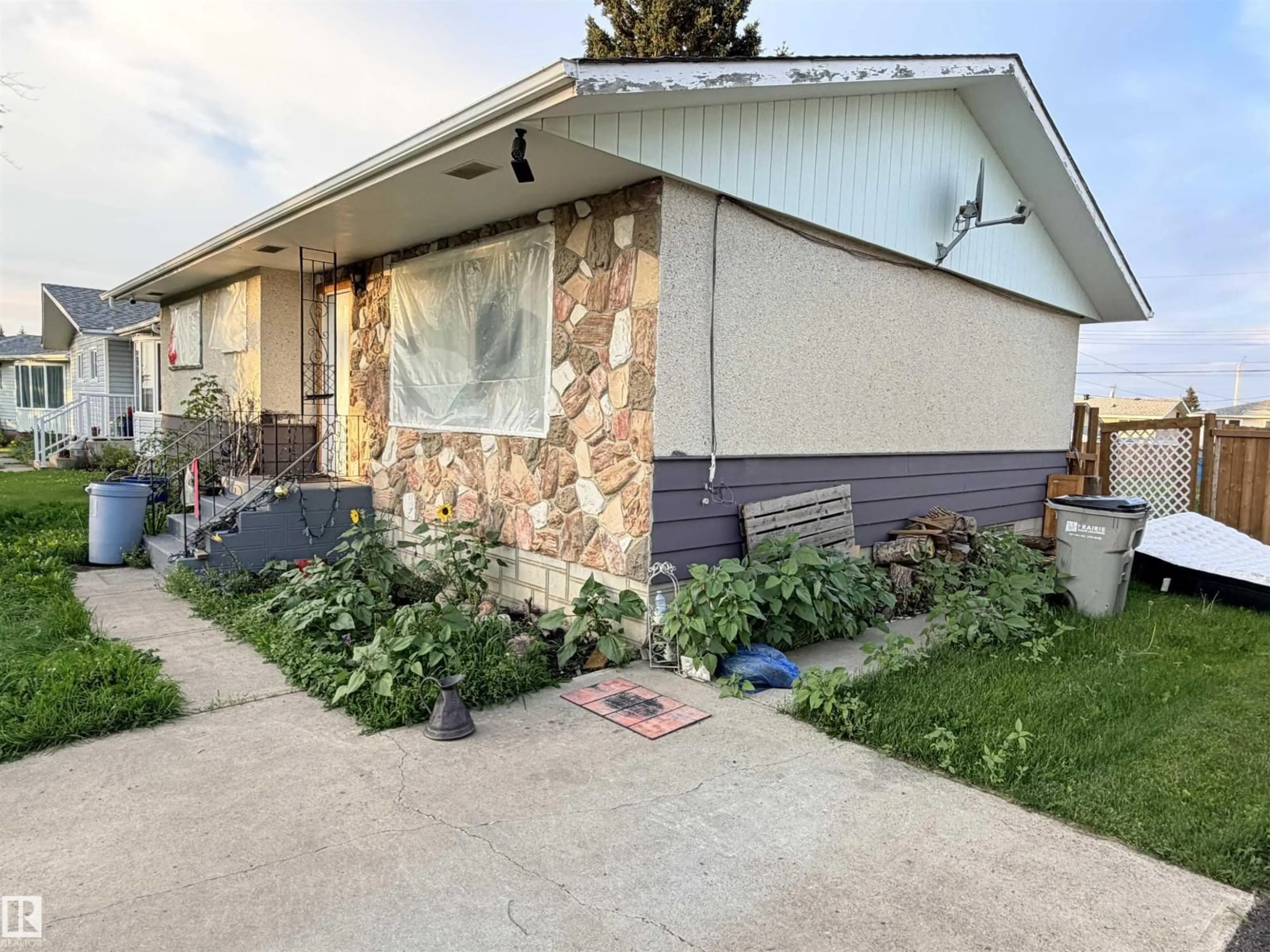 Home with vinyl exterior material, street for 10371 107A AV, Westlock Alberta T7P1J4