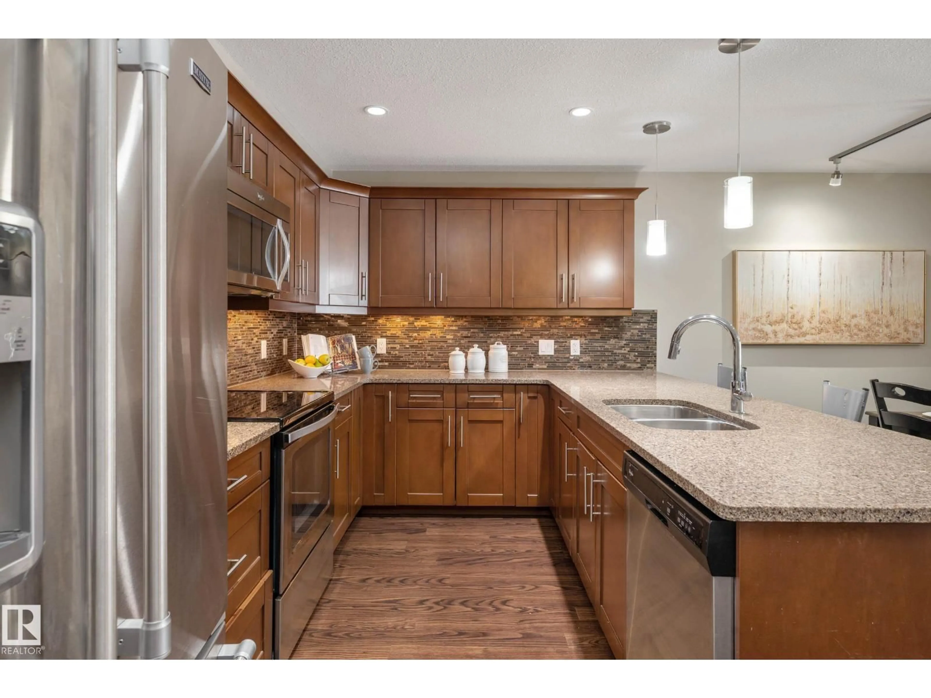Open concept kitchen, ceramic/tile floor for #119 - 1031 173 ST, Edmonton Alberta T6W3E4