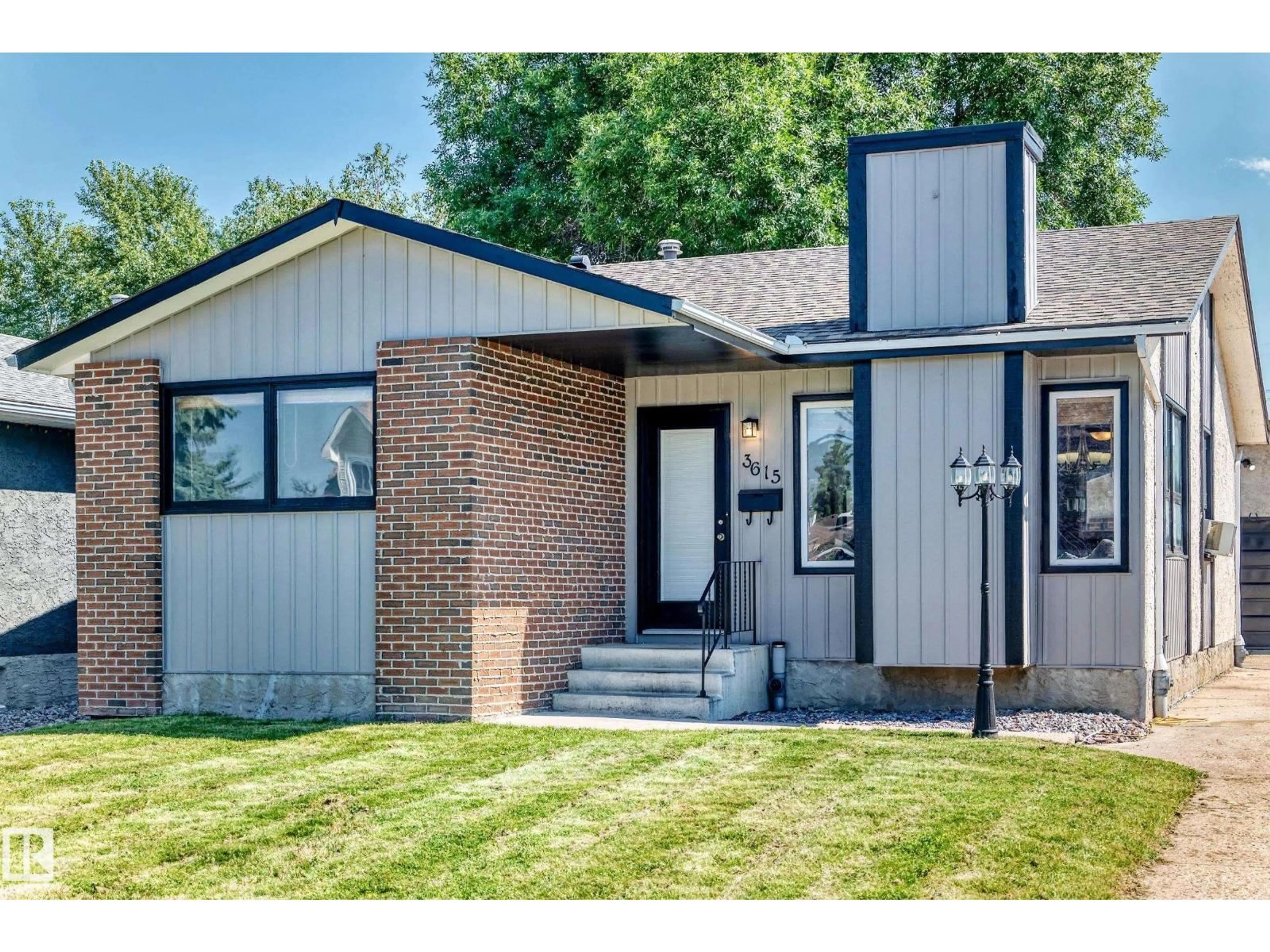 Home with brick exterior material, street for 3615 10 AV, Edmonton Alberta T6L2L2