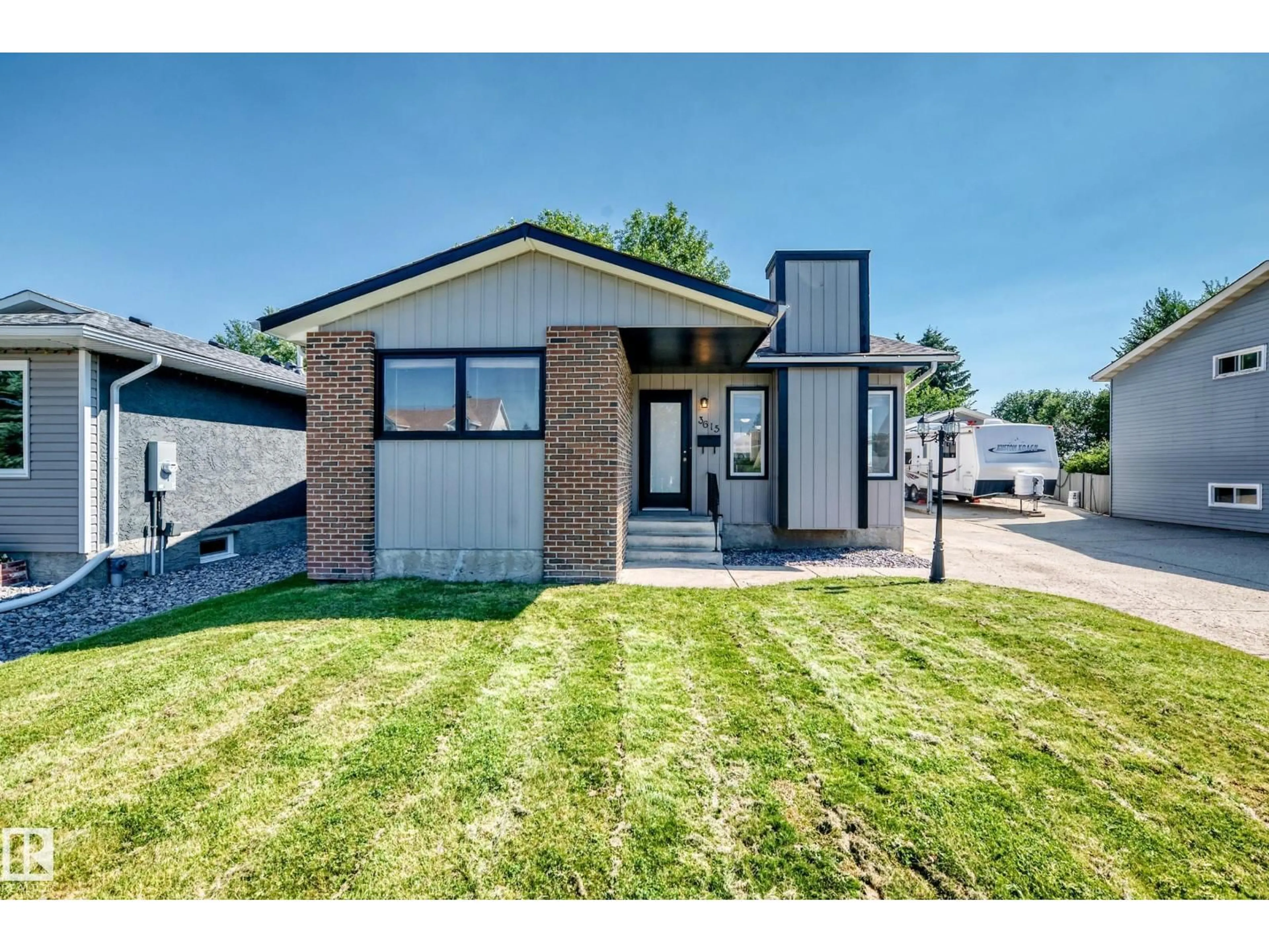 Home with brick exterior material, street for 3615 10 AV, Edmonton Alberta T6L2L2