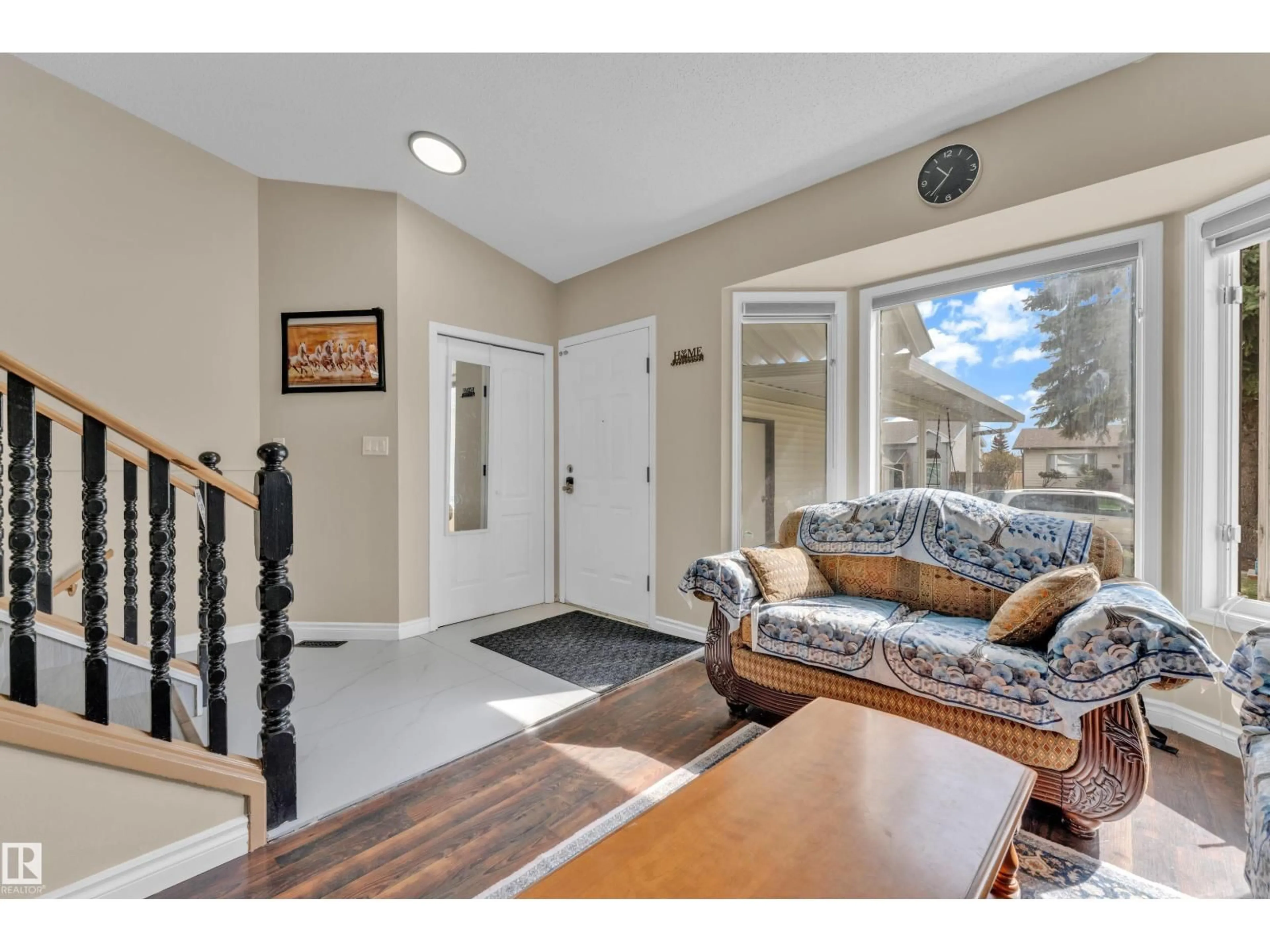 Living room with furniture, unknown for 2416 35 ST, Edmonton Alberta T6L4M3