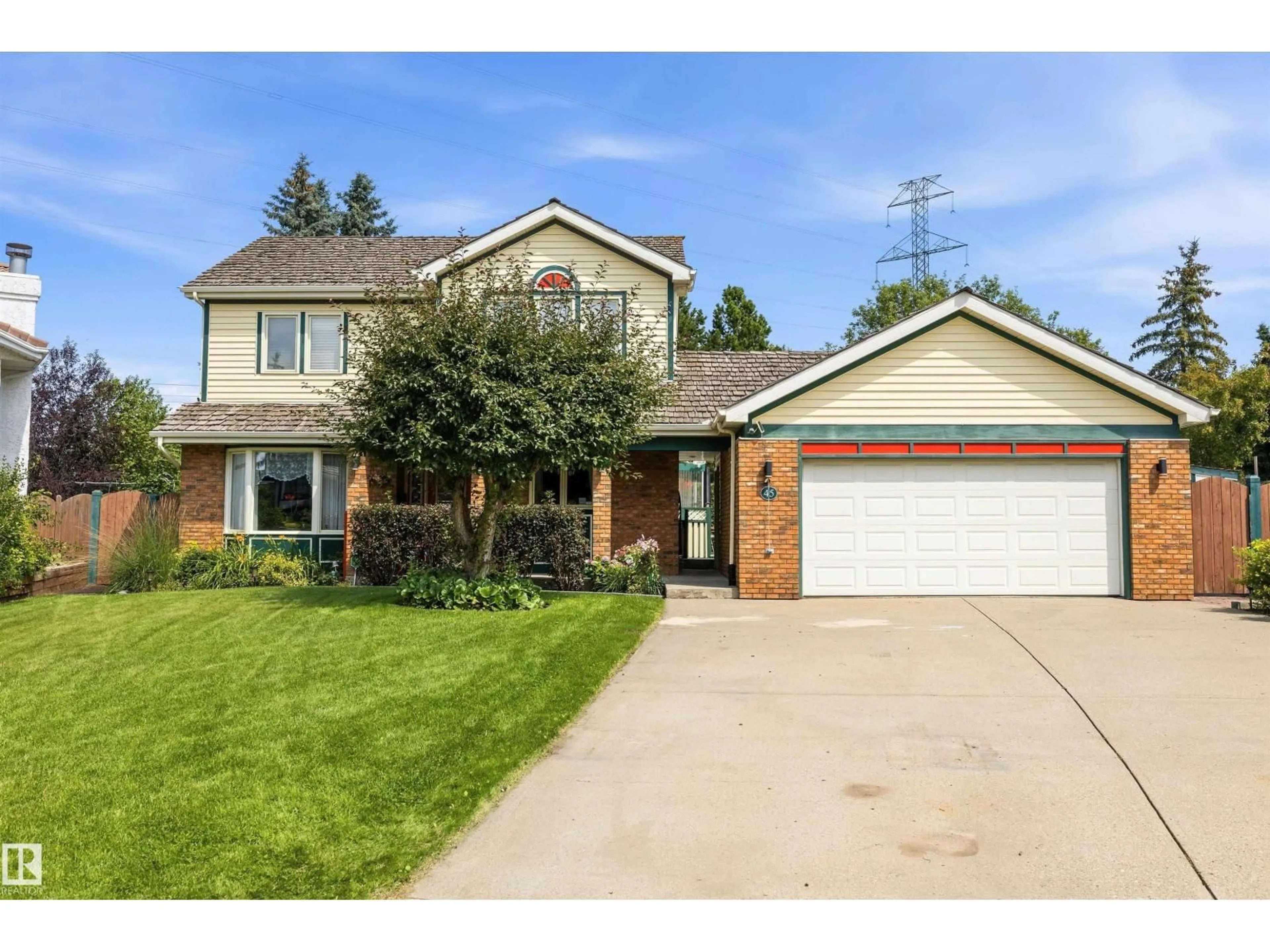 Home with brick exterior material, street for 45 BLUE QUILL CR, Edmonton Alberta T6J6C5