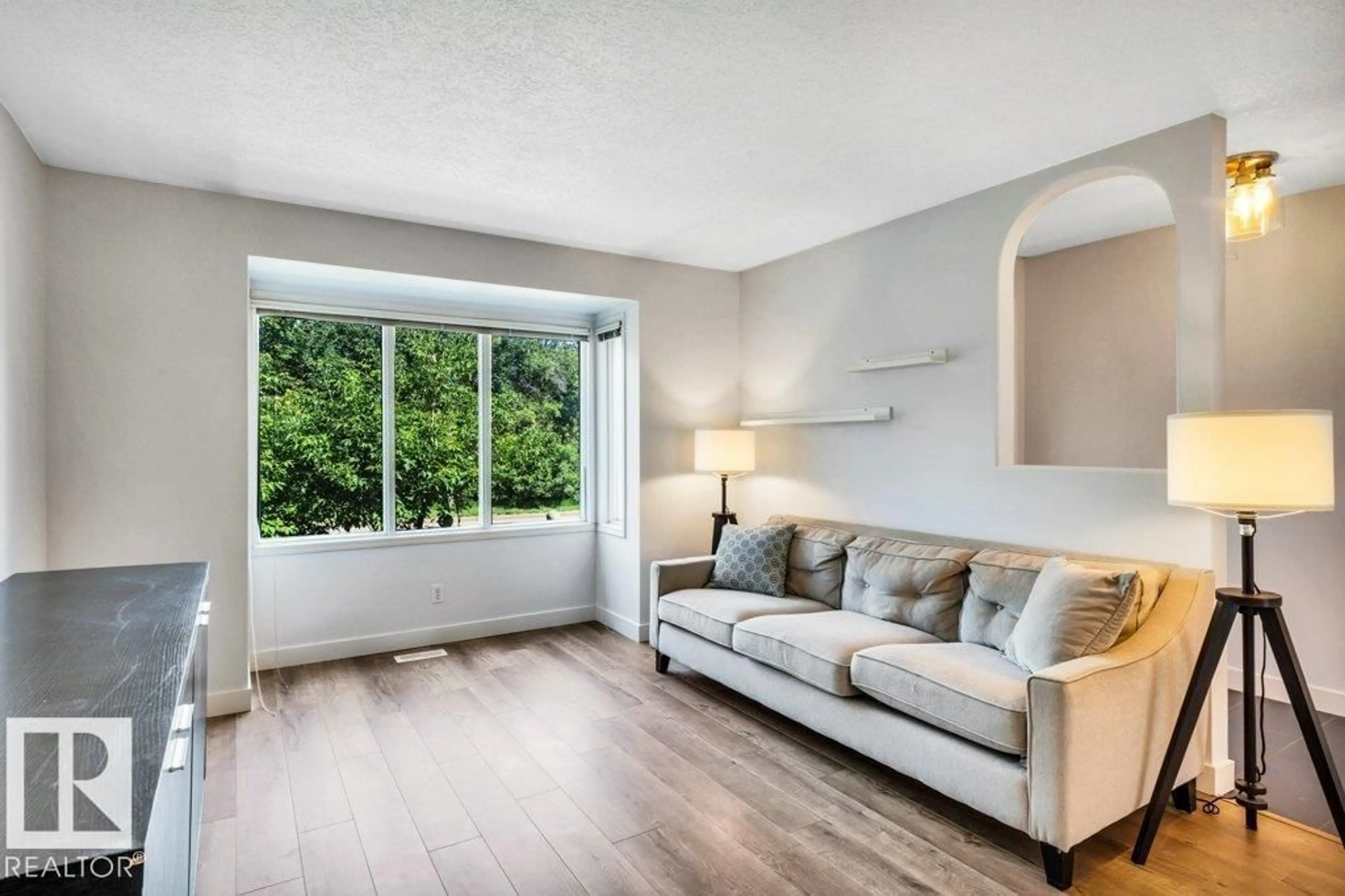 Living room with furniture, unknown for NW - 9321 98 AV, Edmonton Alberta T6C2C6
