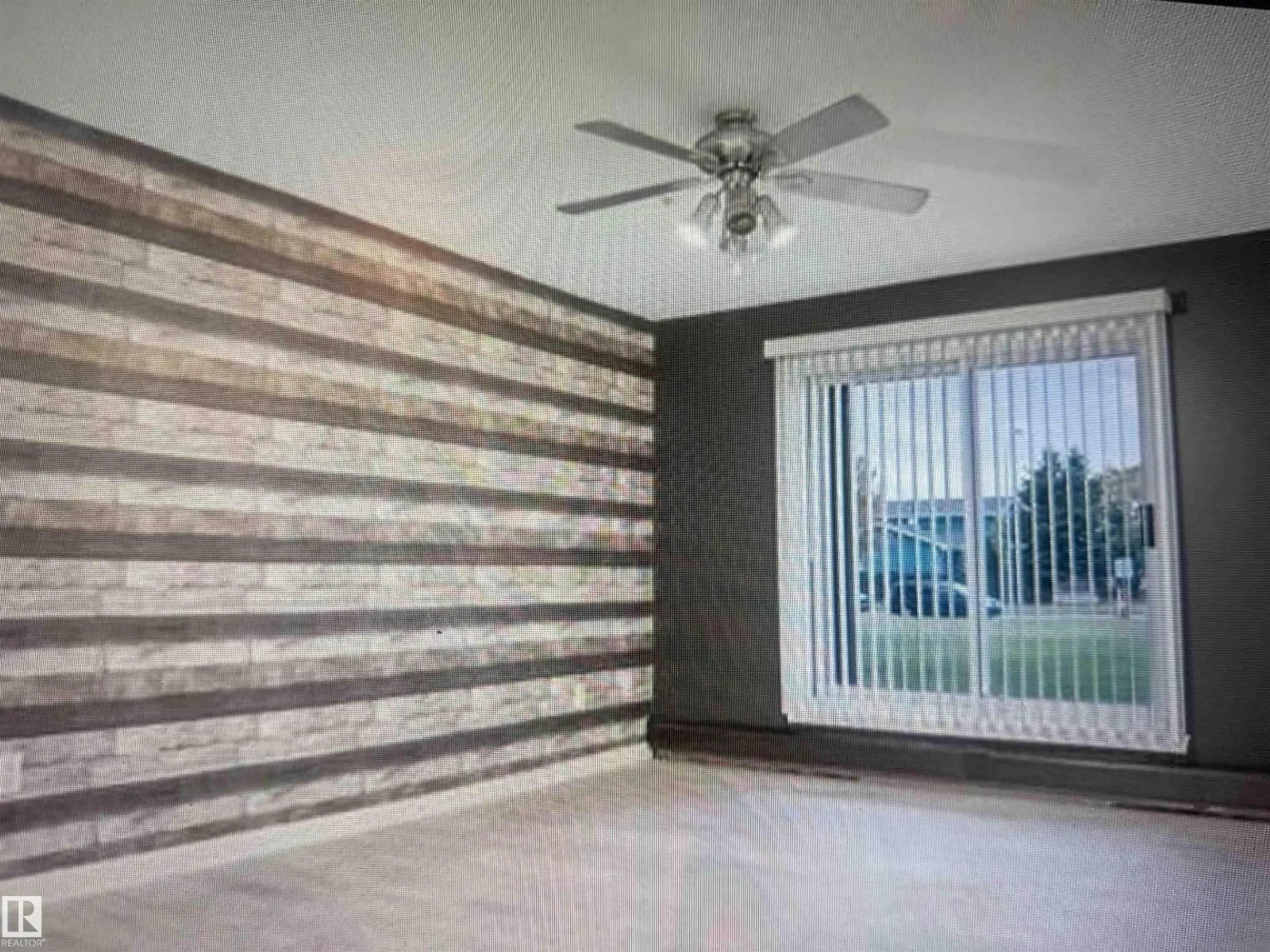 A pic of a room for #106 - 106 HOOKE RD, Edmonton Alberta T5A5H2