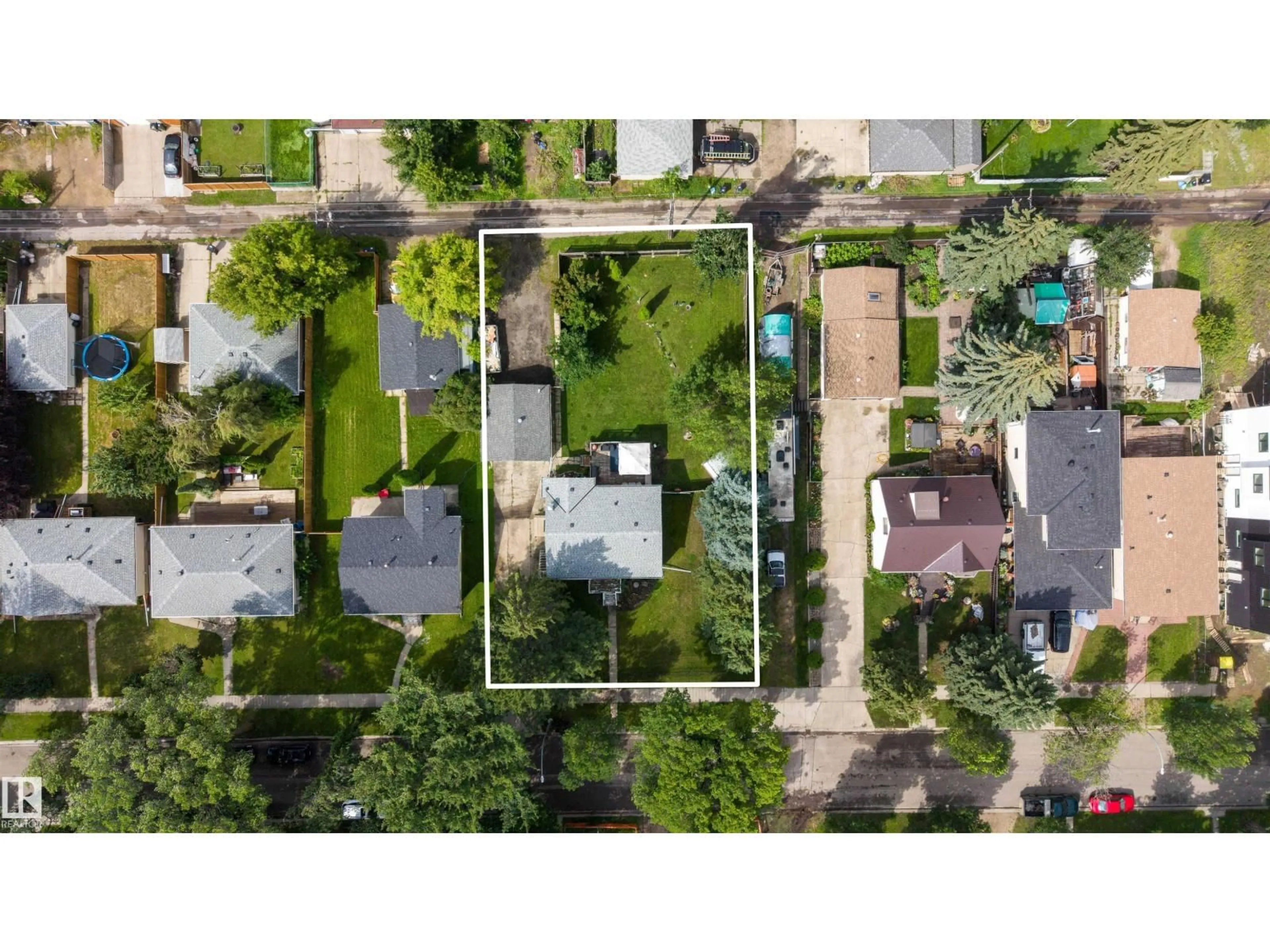A pic from outside/outdoor area/front of a property/back of a property/a pic from drone, street for 12348 128 ST, Edmonton Alberta T5L1C7