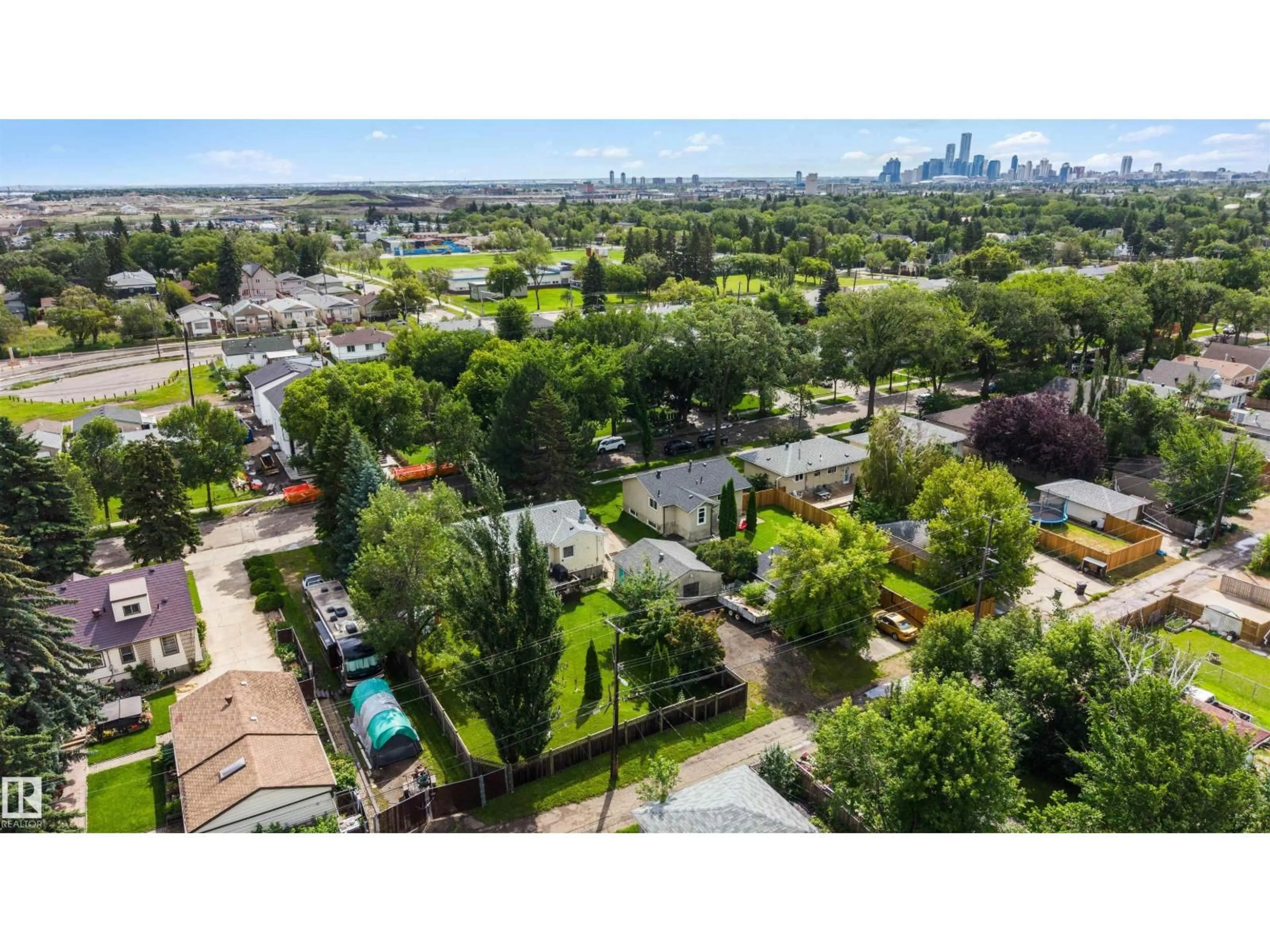 A pic from outside/outdoor area/front of a property/back of a property/a pic from drone, city buildings view from balcony for 12348 128 ST, Edmonton Alberta T5L1C7