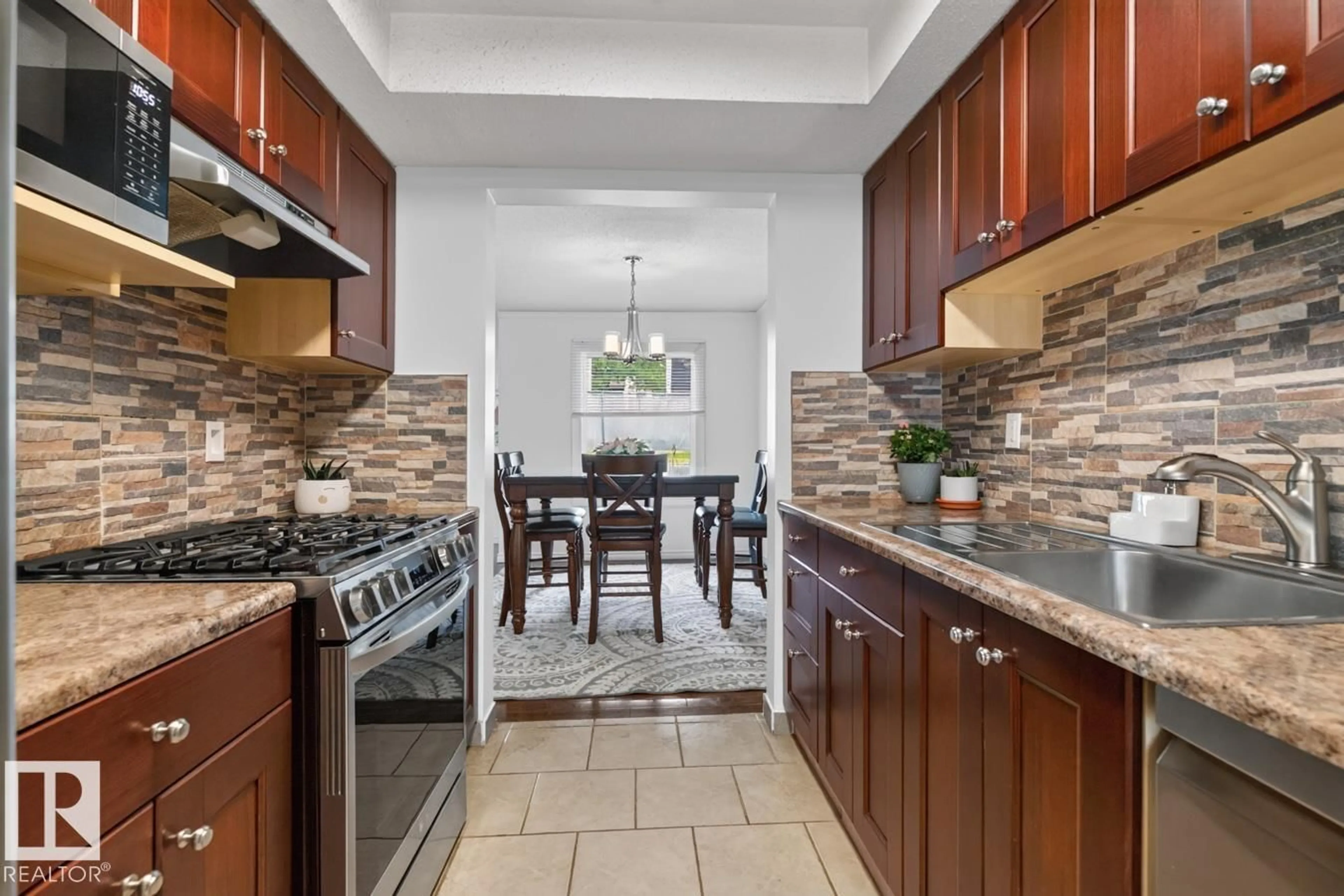 Open concept kitchen, ceramic/tile floor for #23 - 3520 60 ST, Edmonton Alberta T6L6H5