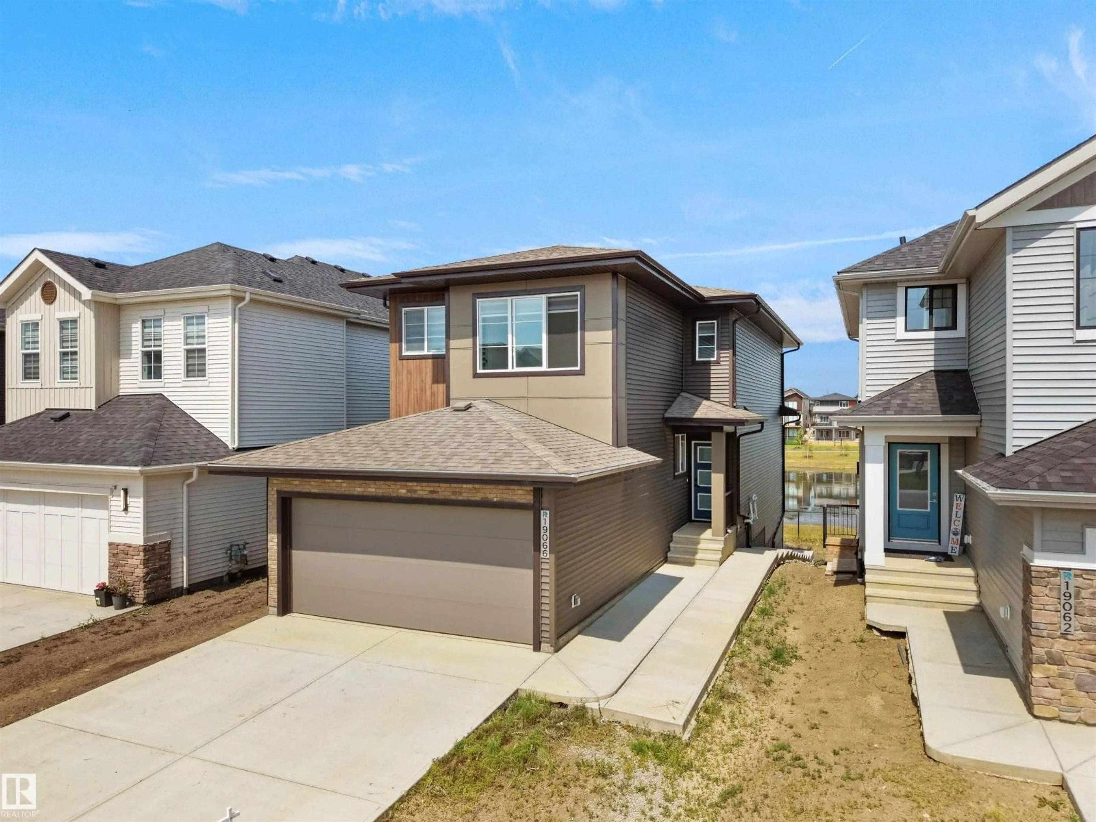 A pic from outside/outdoor area/front of a property/back of a property/a pic from drone, street for 19066 20A AV, Edmonton Alberta T6M3A8