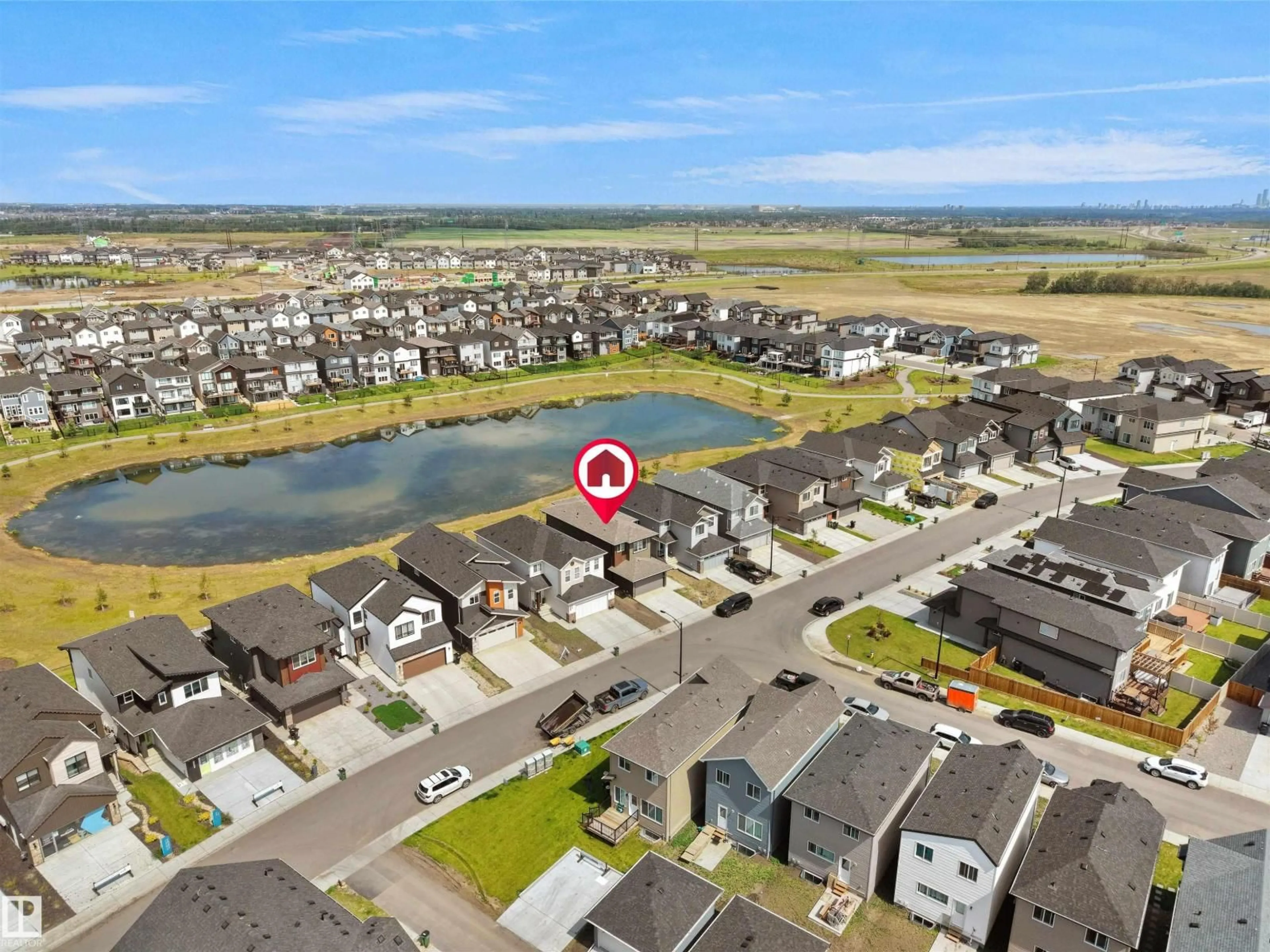 A pic from outside/outdoor area/front of a property/back of a property/a pic from drone, water/lake/river/ocean view for 19066 20A AV, Edmonton Alberta T6M3A8