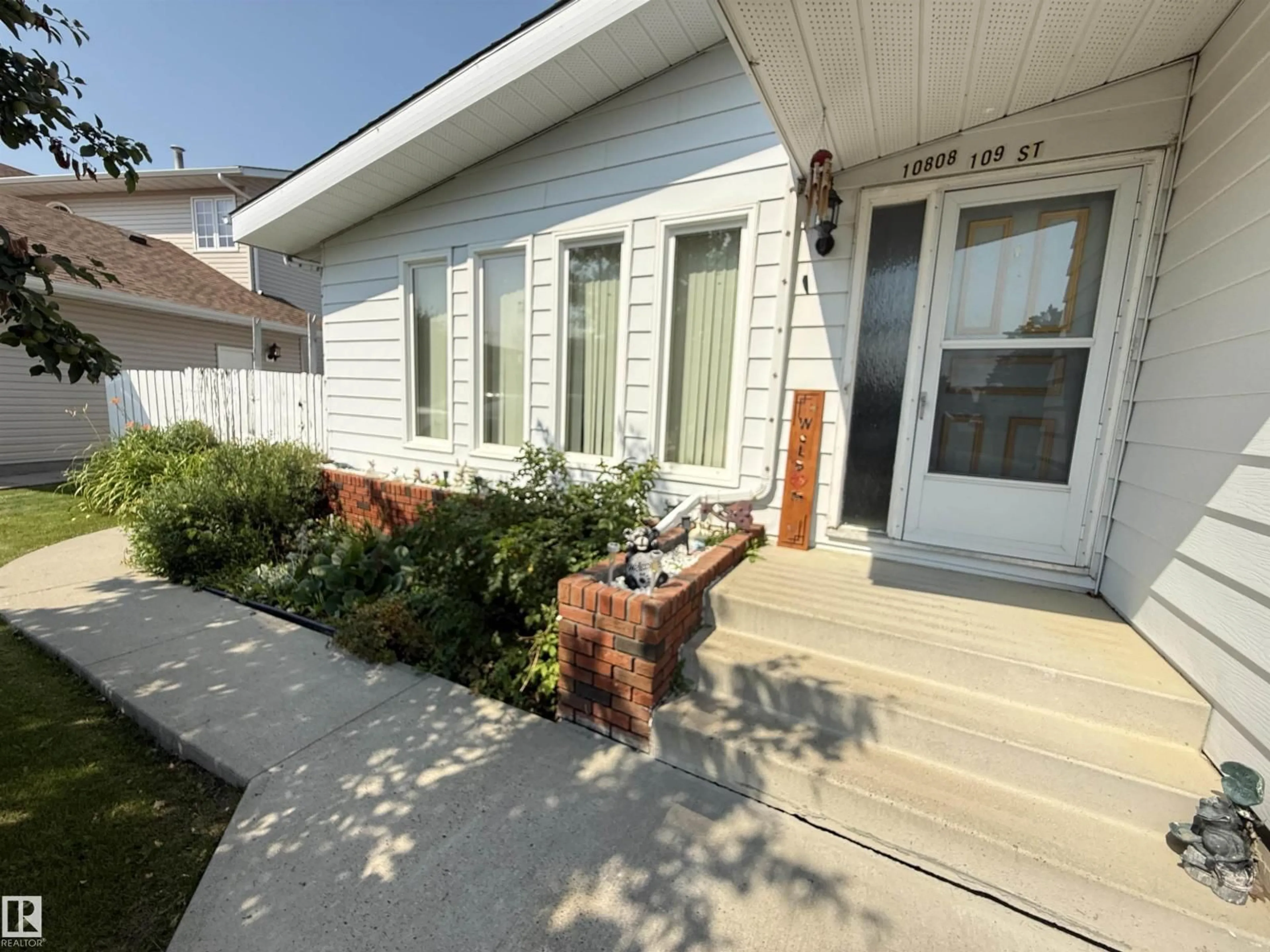 Home with vinyl exterior material, street for 10808 109 STREET, Westlock Alberta T7P1C4