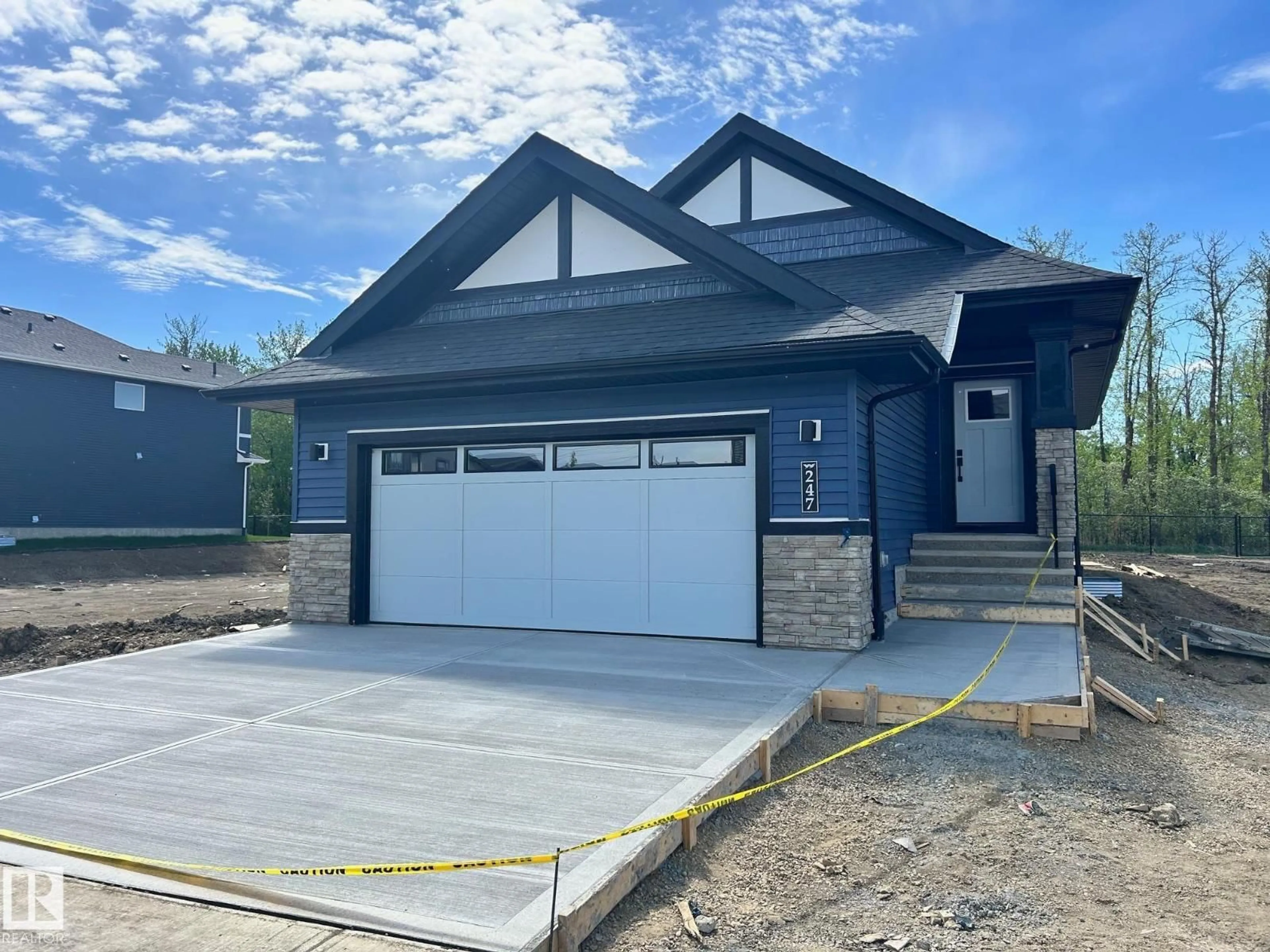 Home with vinyl exterior material, street for 247 EDGEMONT GREEN GR, Edmonton Alberta T6M3J7