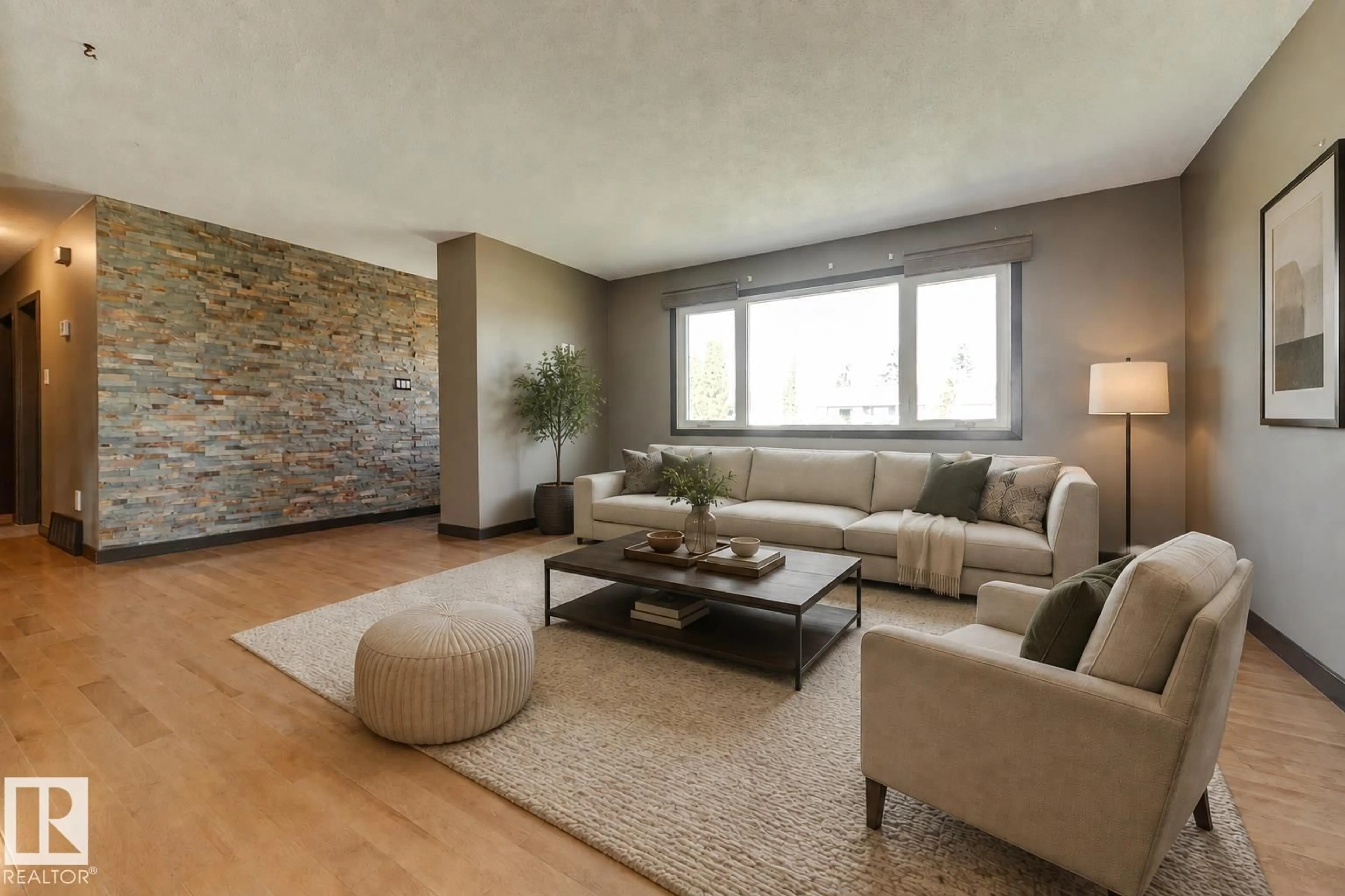 Living room with furniture, wood/laminate floor for 8003 136 AV, Edmonton Alberta T5C2K8