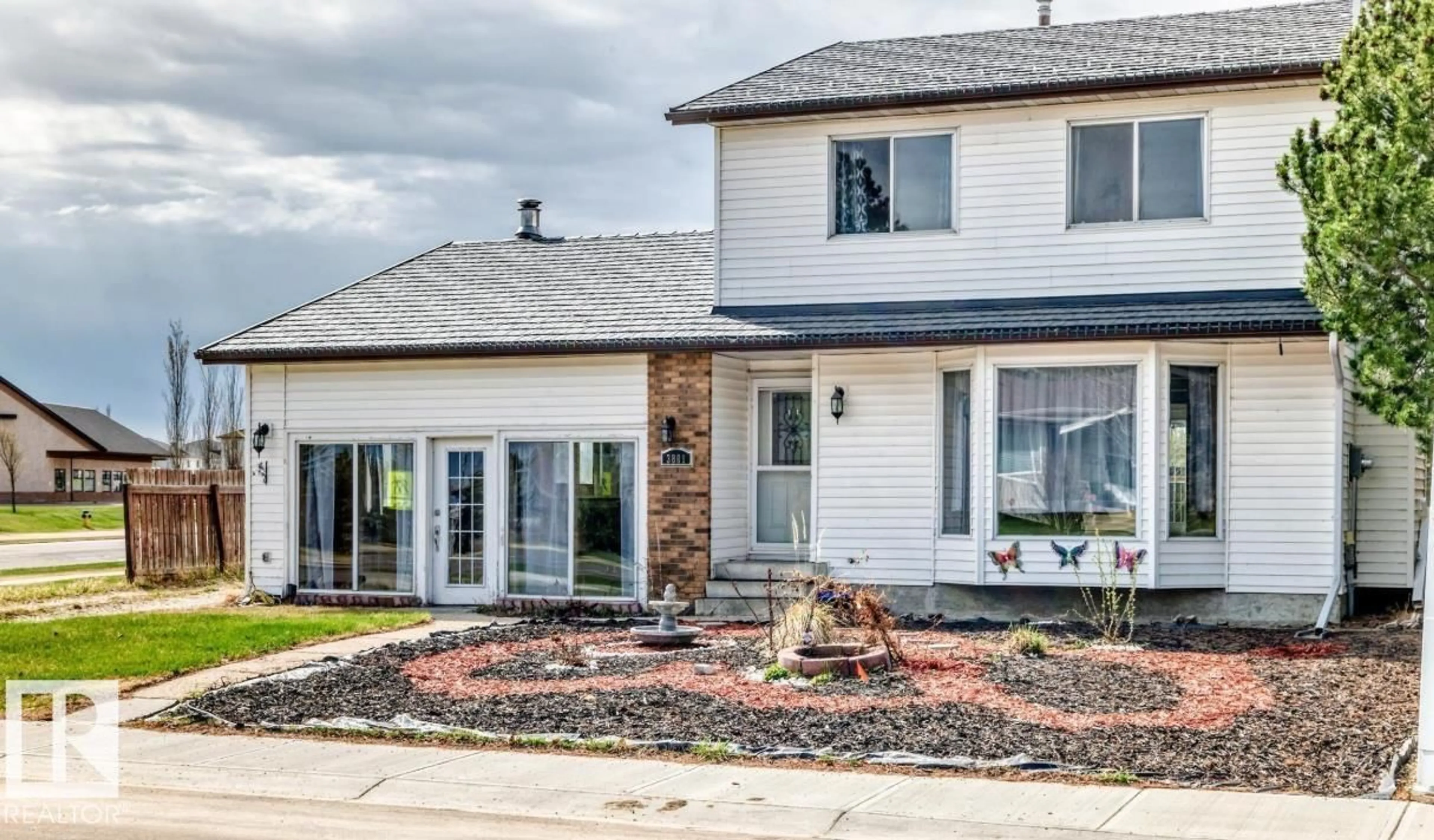 Home with brick exterior material, street for 3801 33 AV, Leduc Alberta T9E6E5