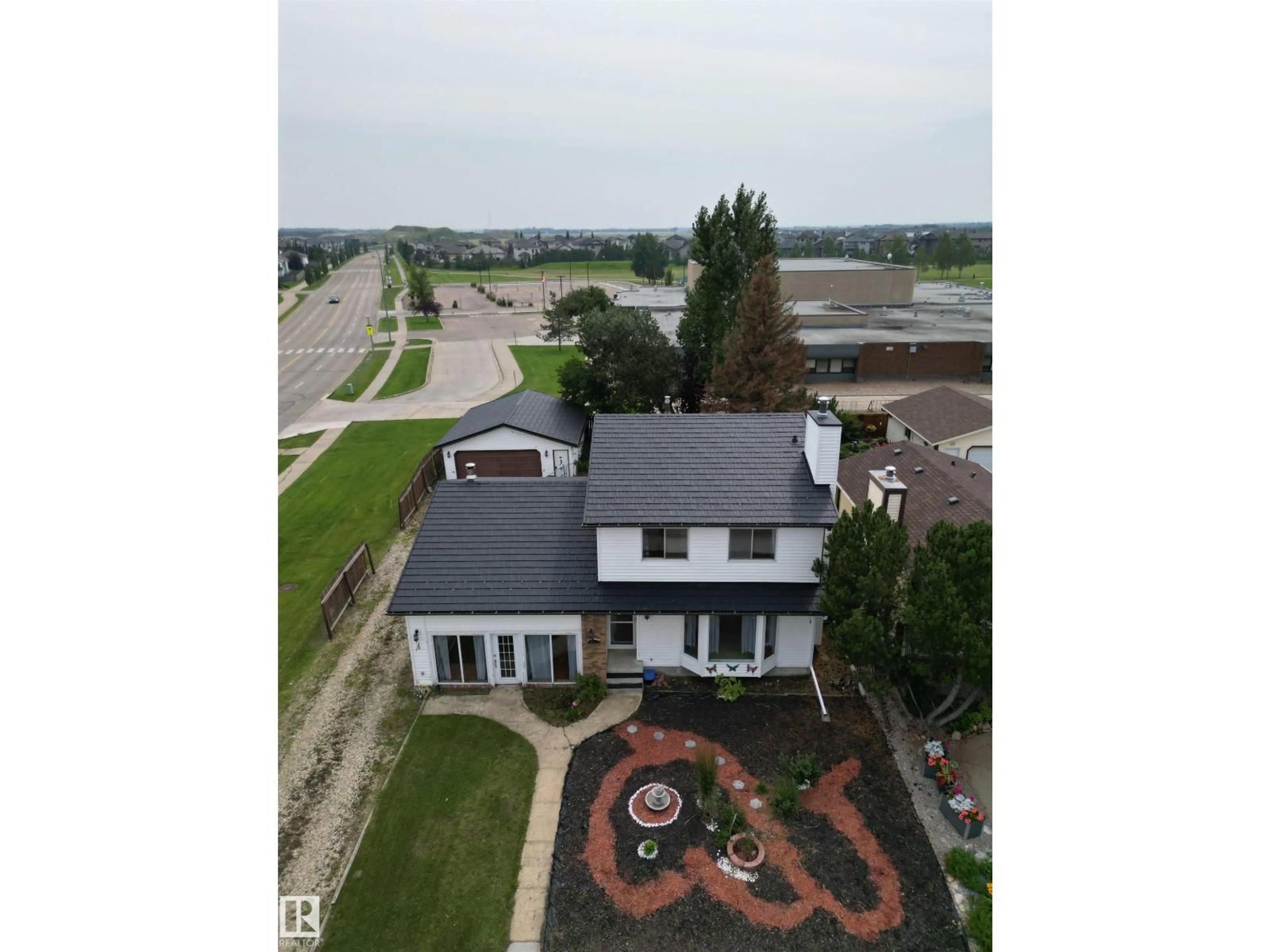A pic from outside/outdoor area/front of a property/back of a property/a pic from drone, unknown for 3801 33 AV, Leduc Alberta T9E6E5