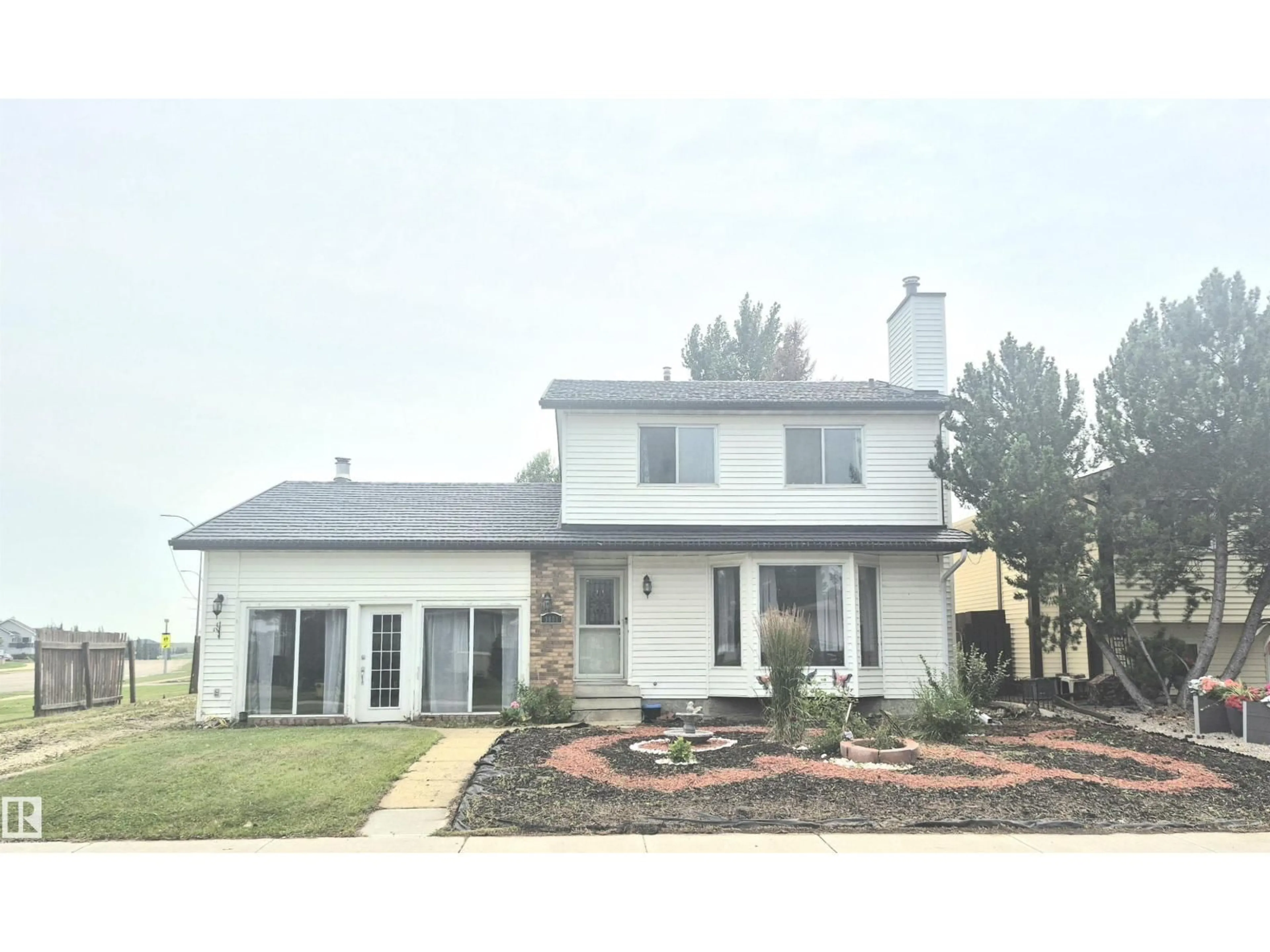 Home with vinyl exterior material, street for 3801 33 AV, Leduc Alberta T9E6E5