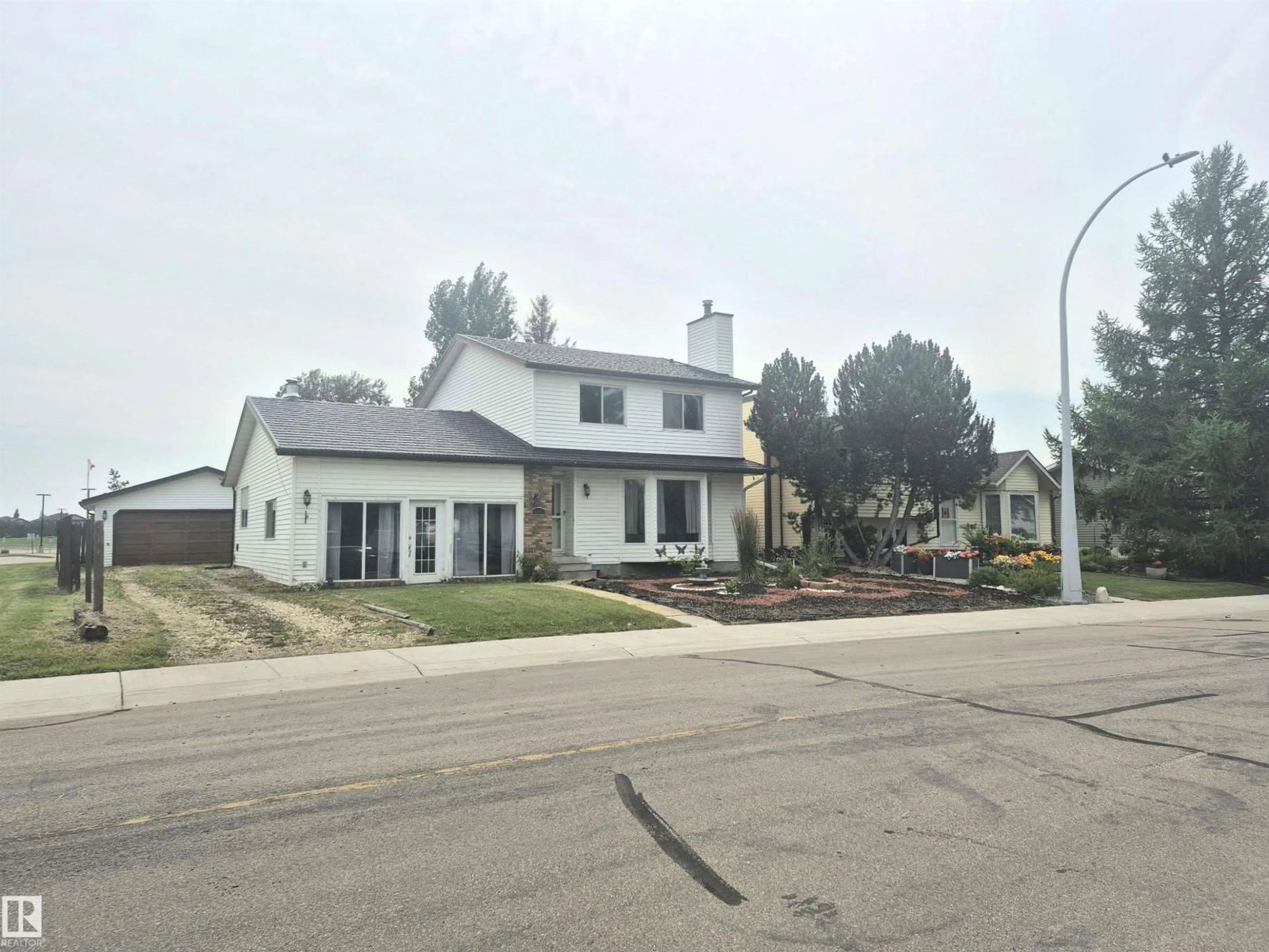 Home with vinyl exterior material, street for 3801 33 AV, Leduc Alberta T9E6E5