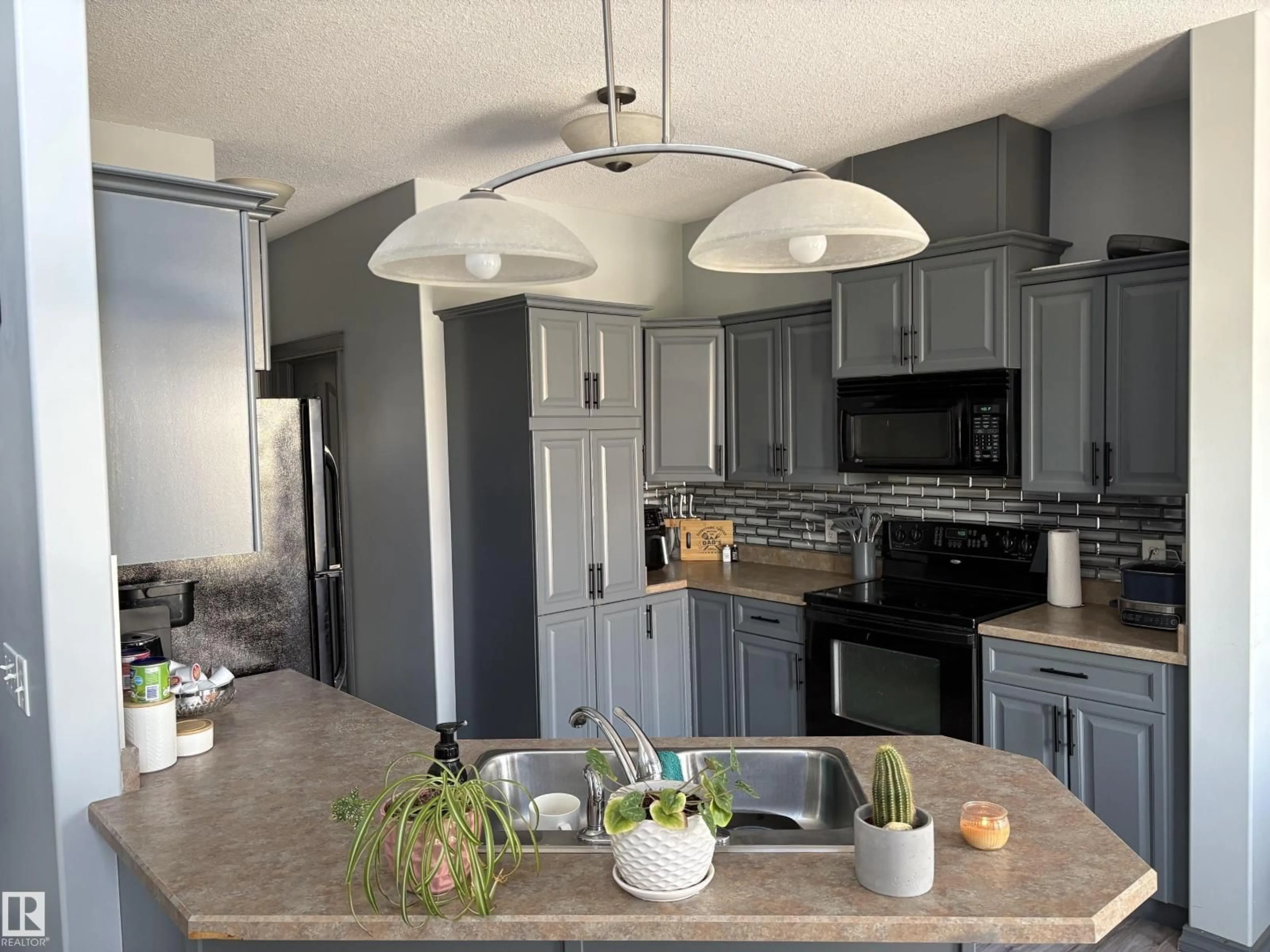 Open concept kitchen, unknown for 18 - 4900 62 ST, Beaumont Alberta T4X0C6