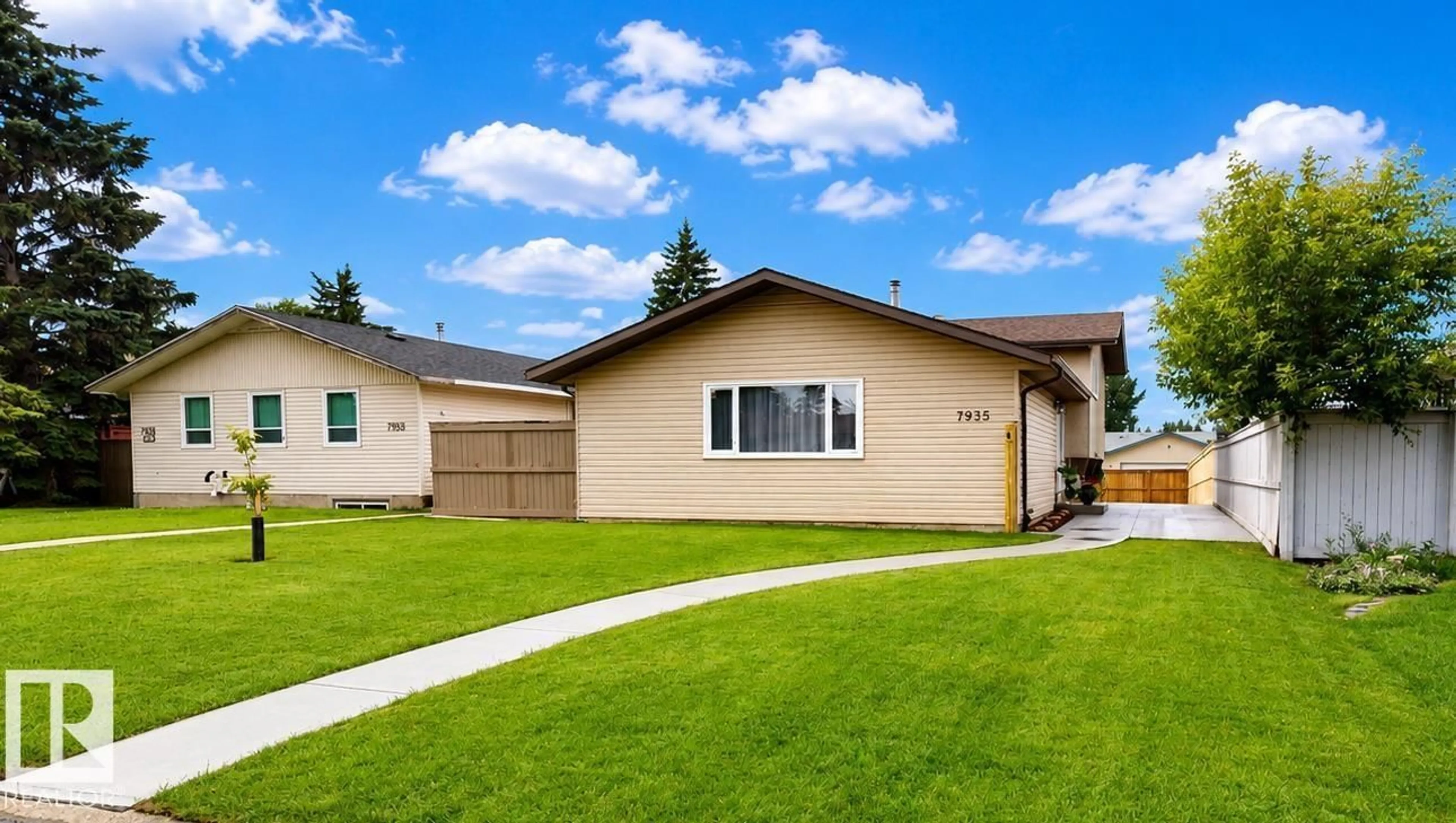 Home with vinyl exterior material, street for 7935 22 AV, Edmonton Alberta T6K1Z2