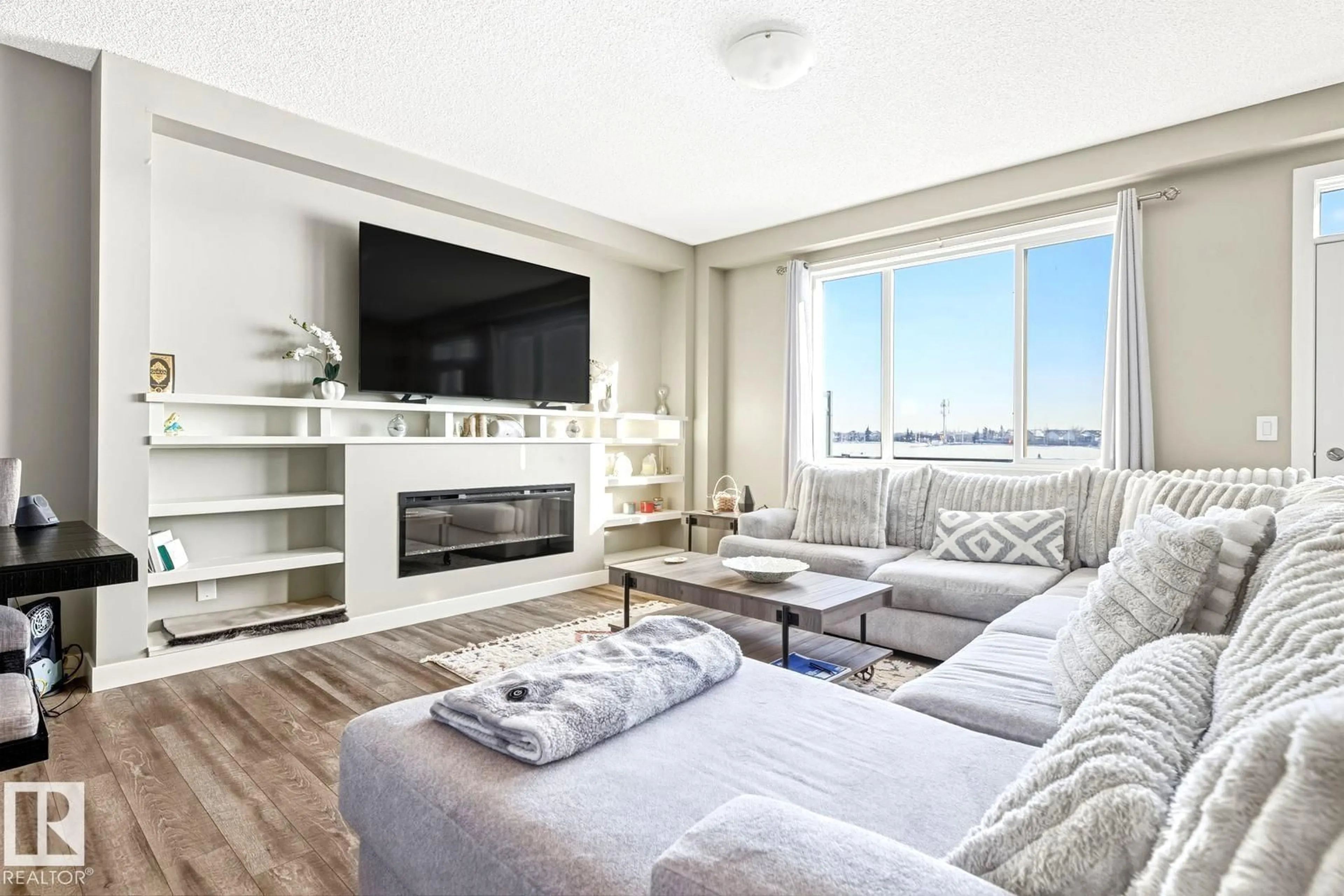 Living room with furniture, unknown for 92 16903 68 ST NW, Edmonton Alberta T5Z0R1