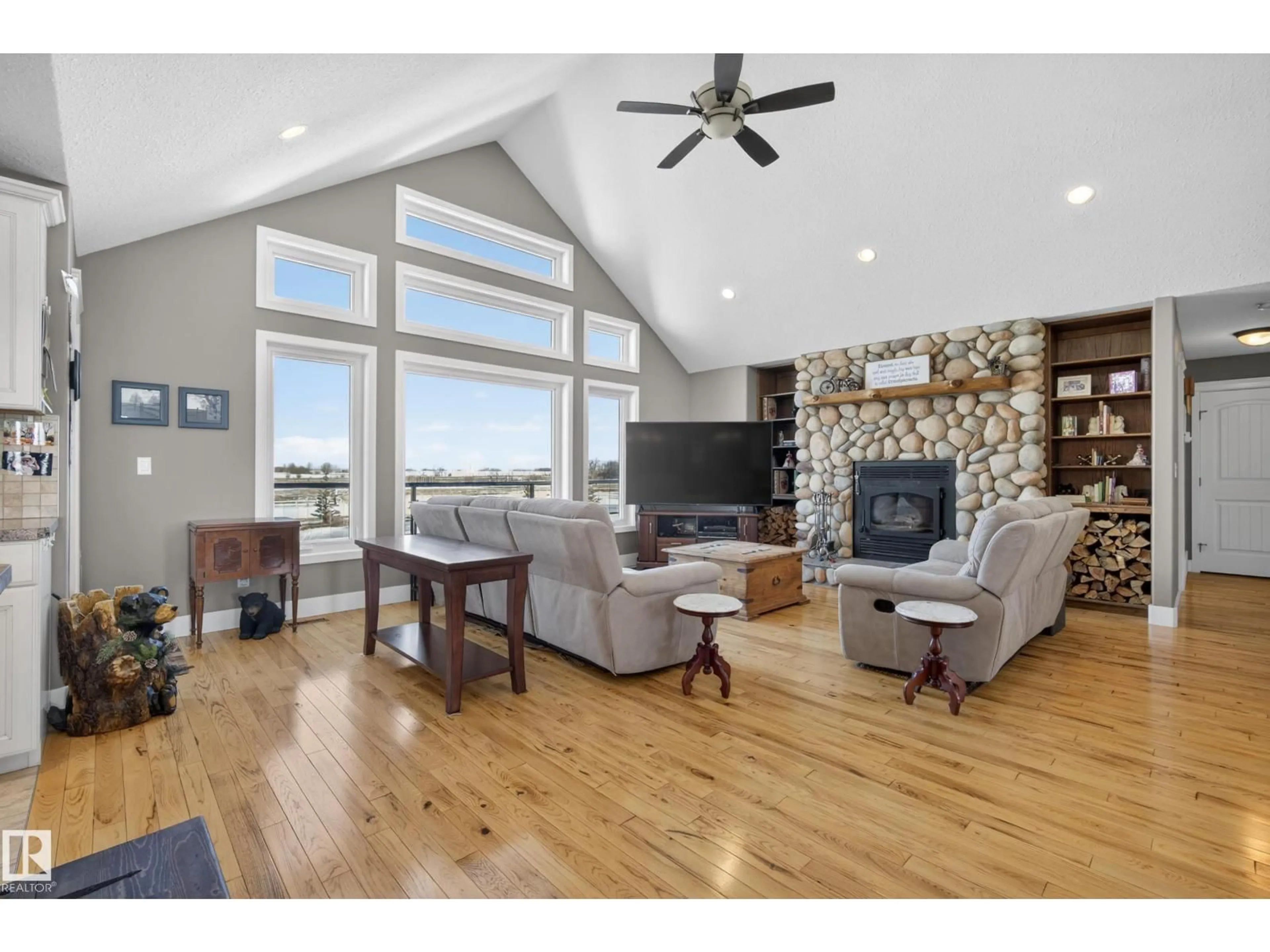 Living room with furniture, wood/laminate floor for 531064 RANGE ROAD 174, Rural Lamont County Alberta T0B3H0