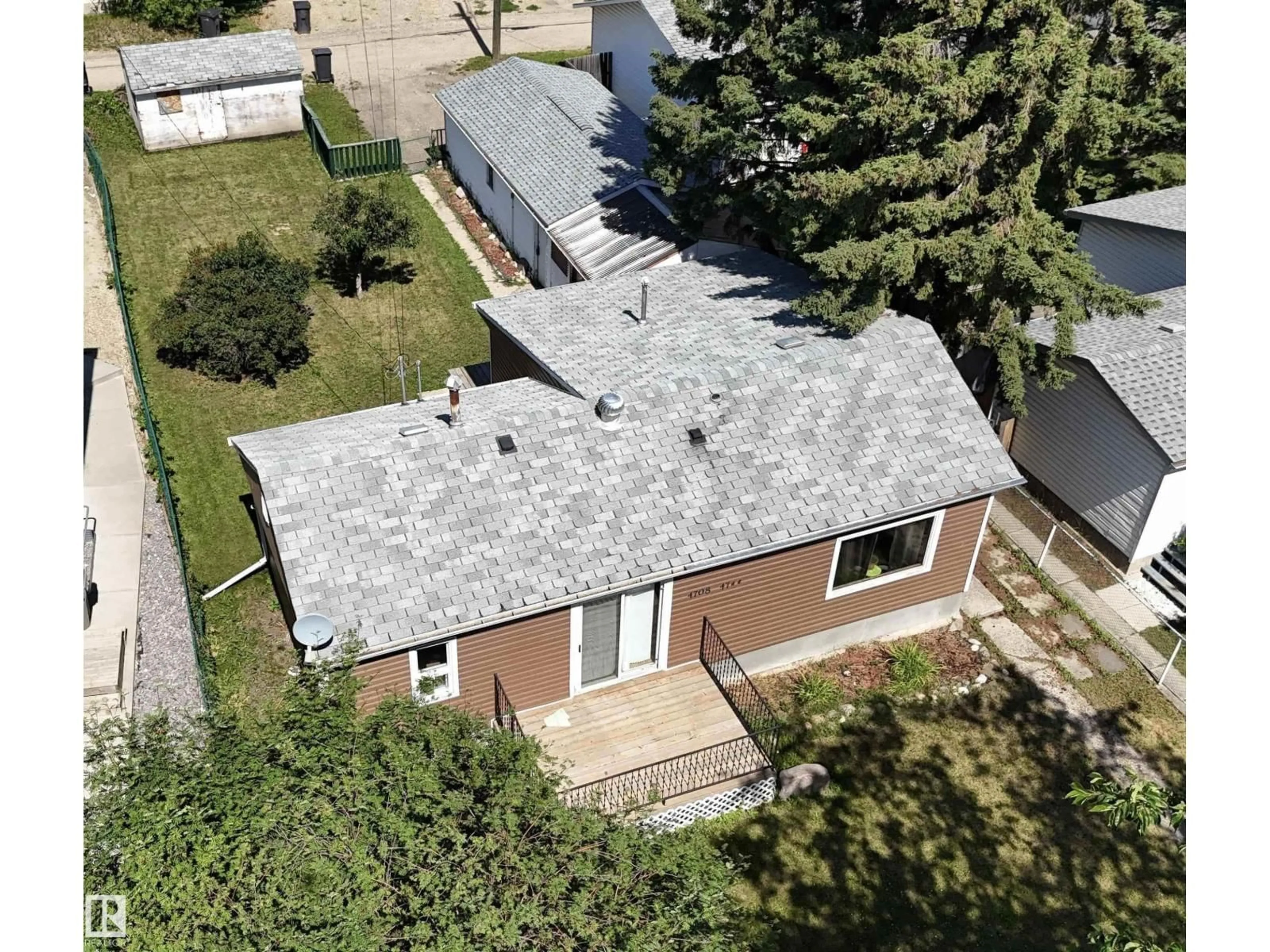 A pic from outside/outdoor area/front of a property/back of a property/a pic from drone, street for 4708 47 AV, Drayton Valley Alberta T7A1H7