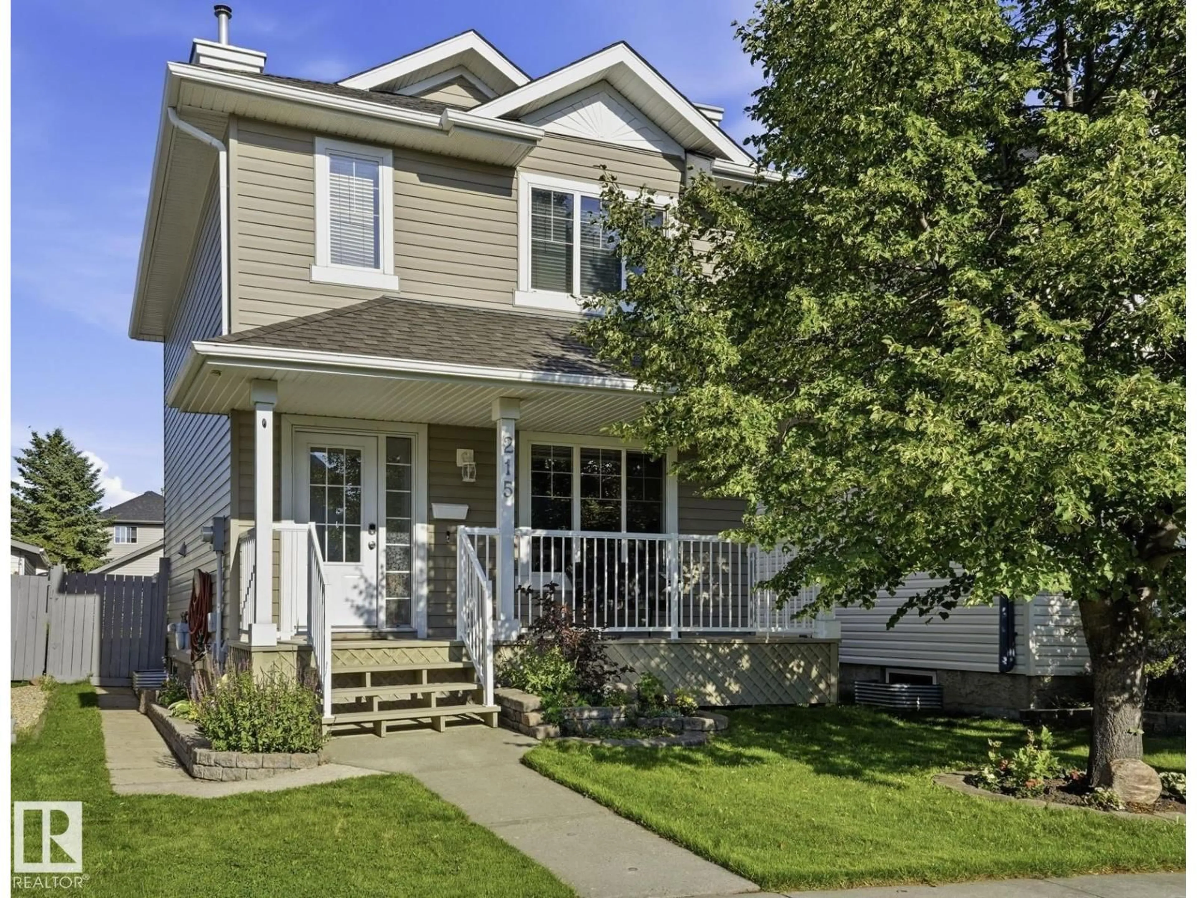 Home with vinyl exterior material, street for SW - 215 85 ST, Edmonton Alberta T6X1H5