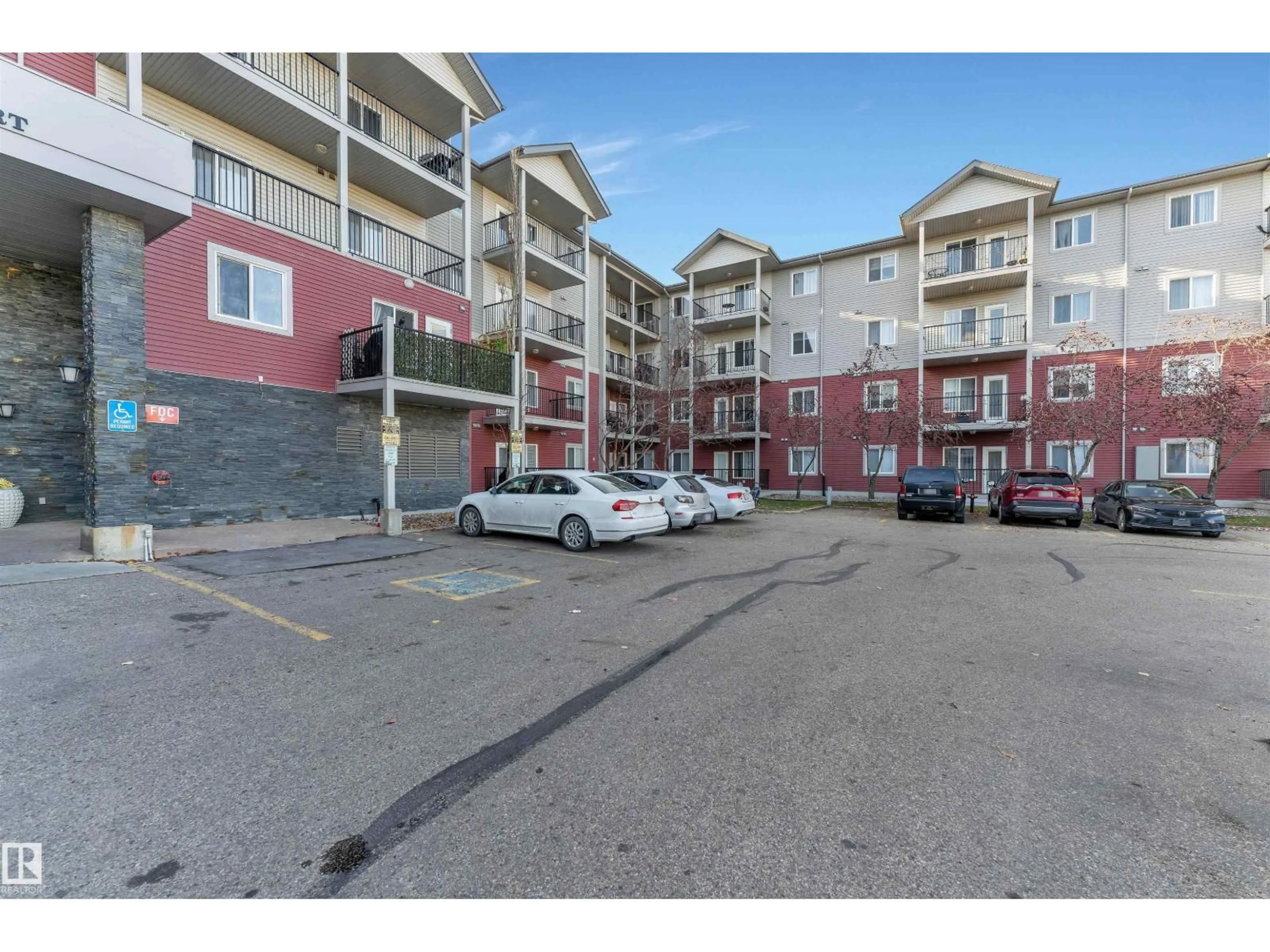A pic from outside/outdoor area/front of a property/back of a property/a pic from drone, street for 111 - 326 EDWARDS DR, Edmonton Alberta T6X0C4