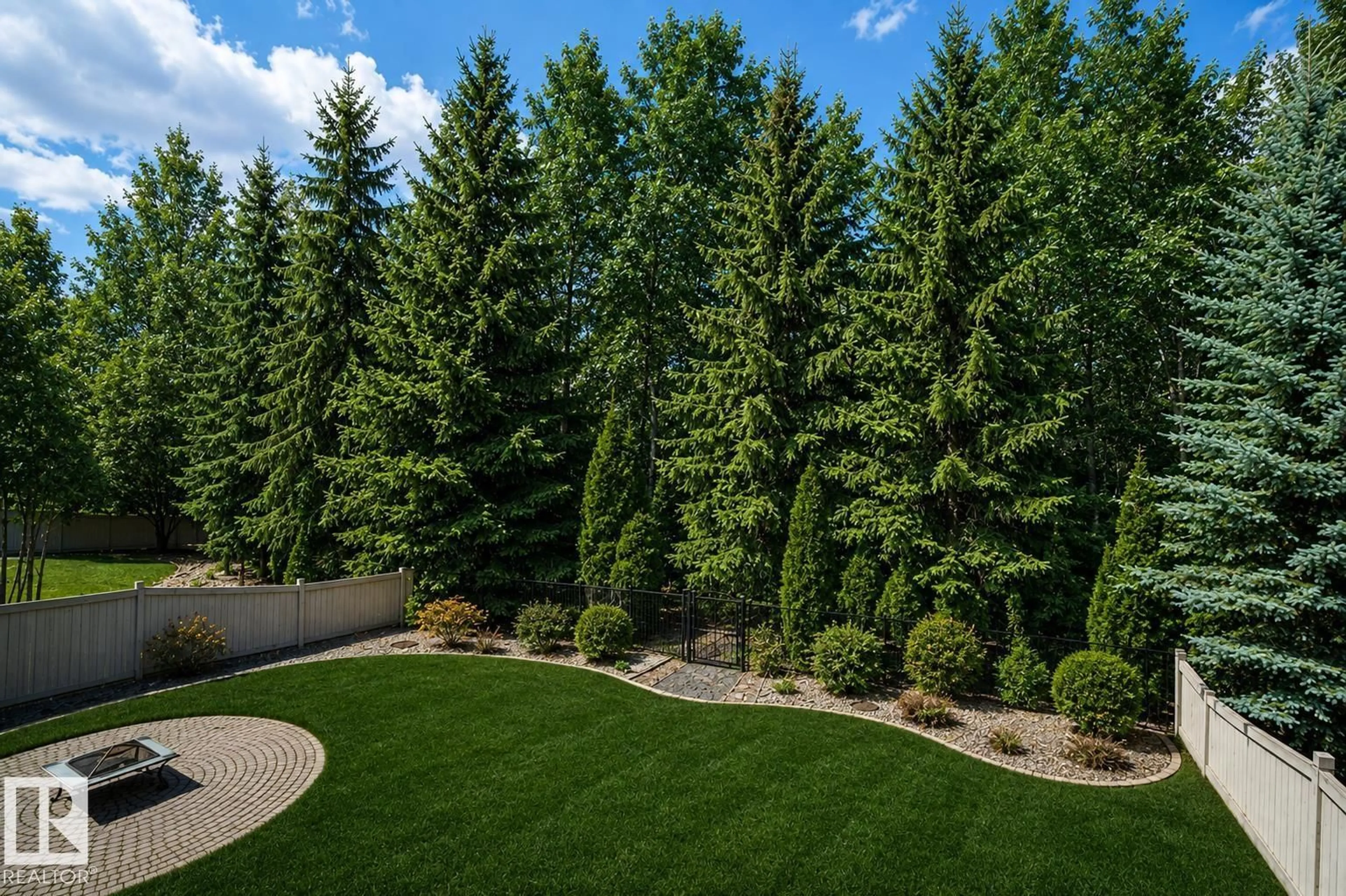 A pic from outside/outdoor area/front of a property/back of a property/a pic from drone, forest/trees view for 322 CALDWELL CL, Edmonton Alberta T6M2W9