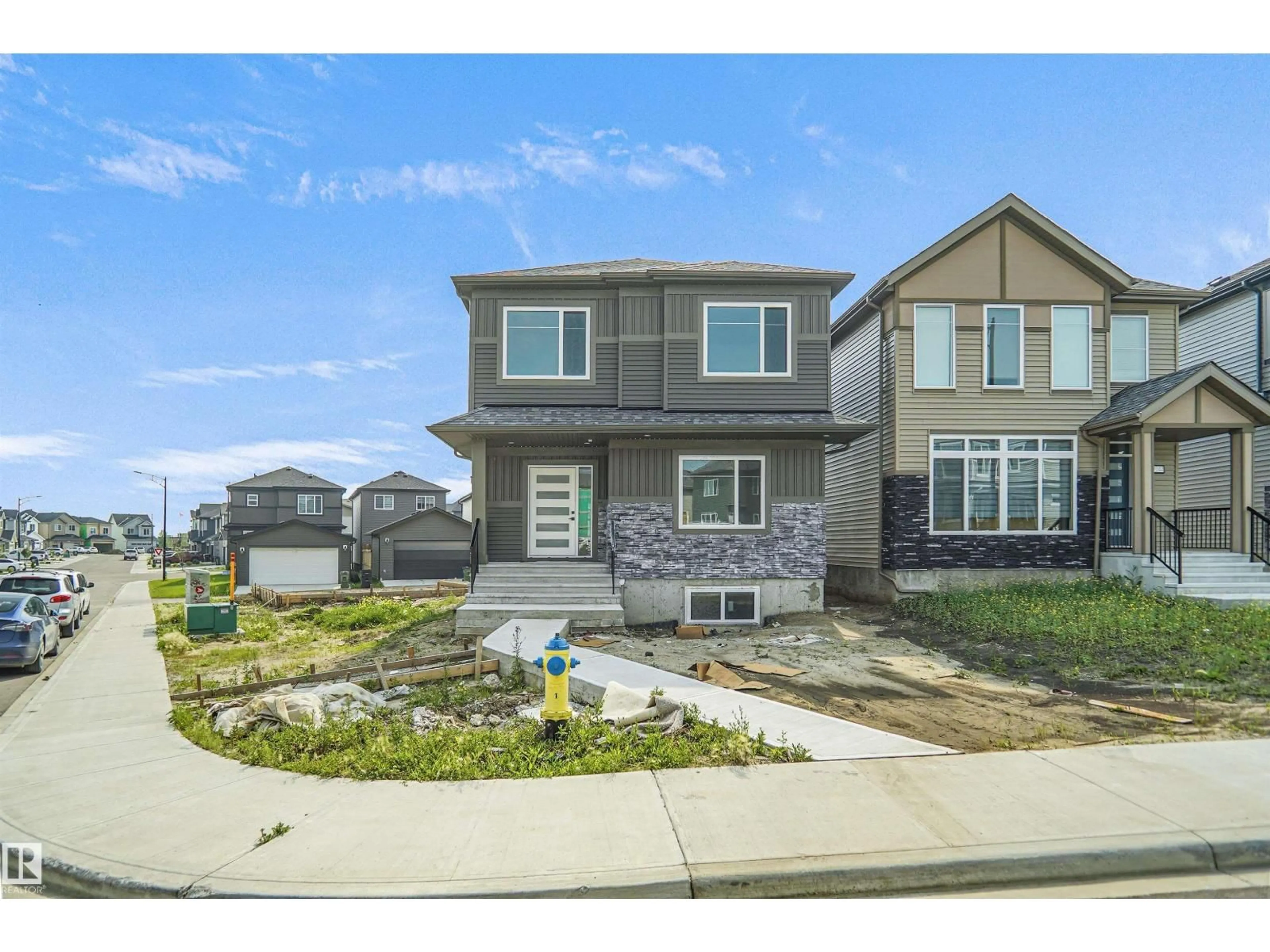 Home with vinyl exterior material, street for NW - 17040 47 ST, Edmonton Alberta T5Y3A6