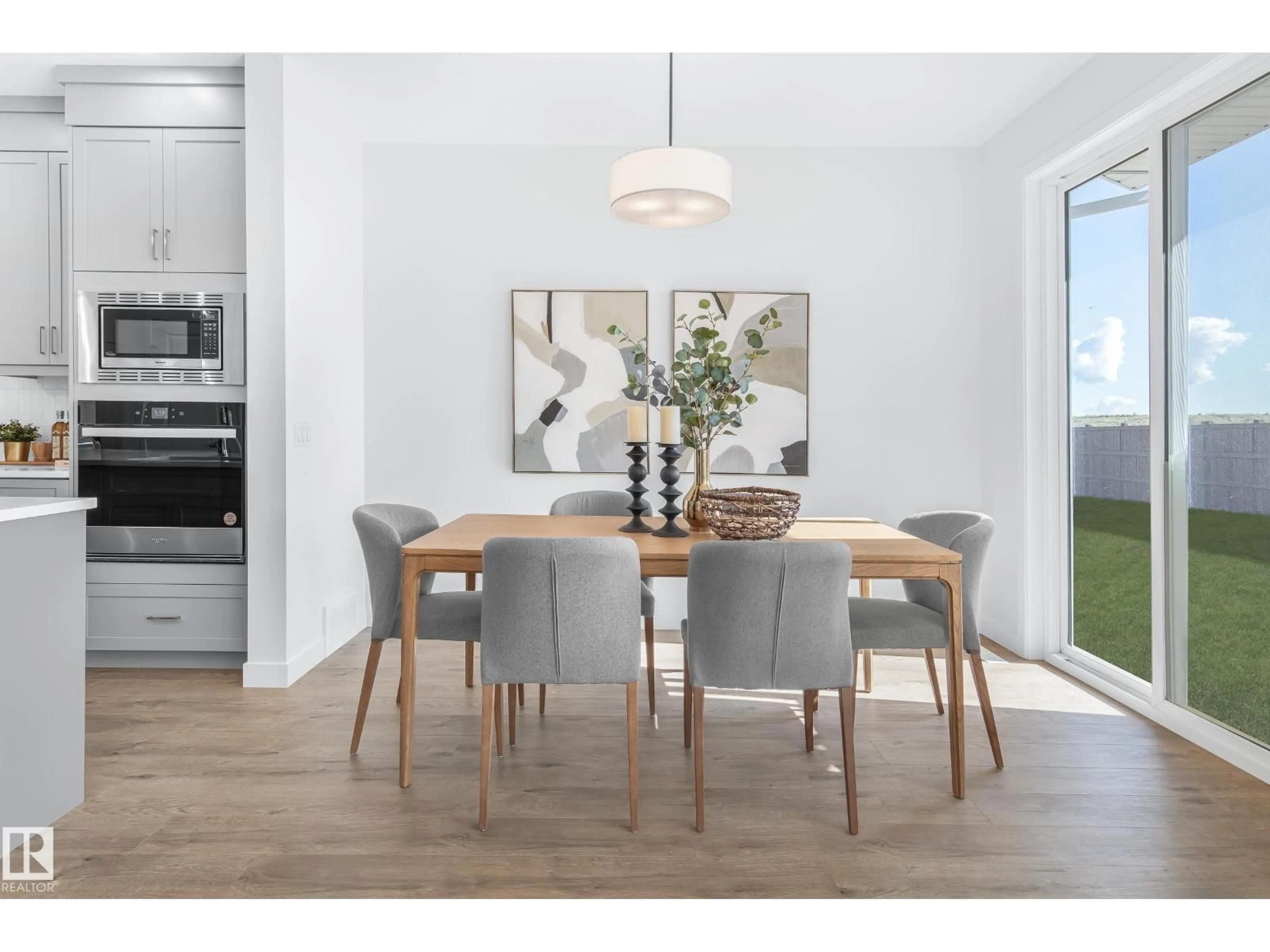 Dining room, wood/laminate floor for 1424 CRISTALL PL, Edmonton Alberta T6W5S9