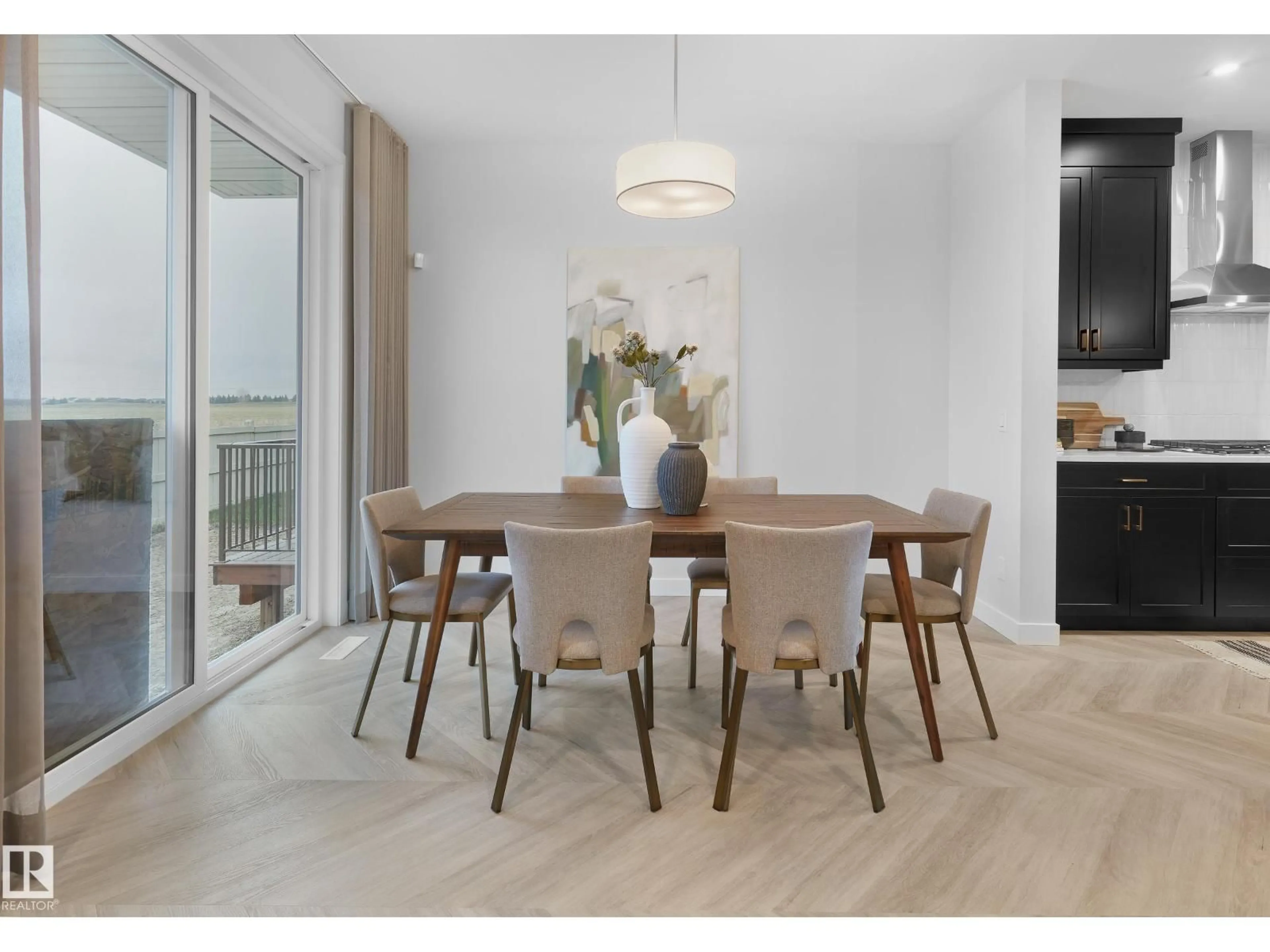 Dining room, wood/laminate floor for 1124 CRISTALL CR, Edmonton Alberta T6W5S9
