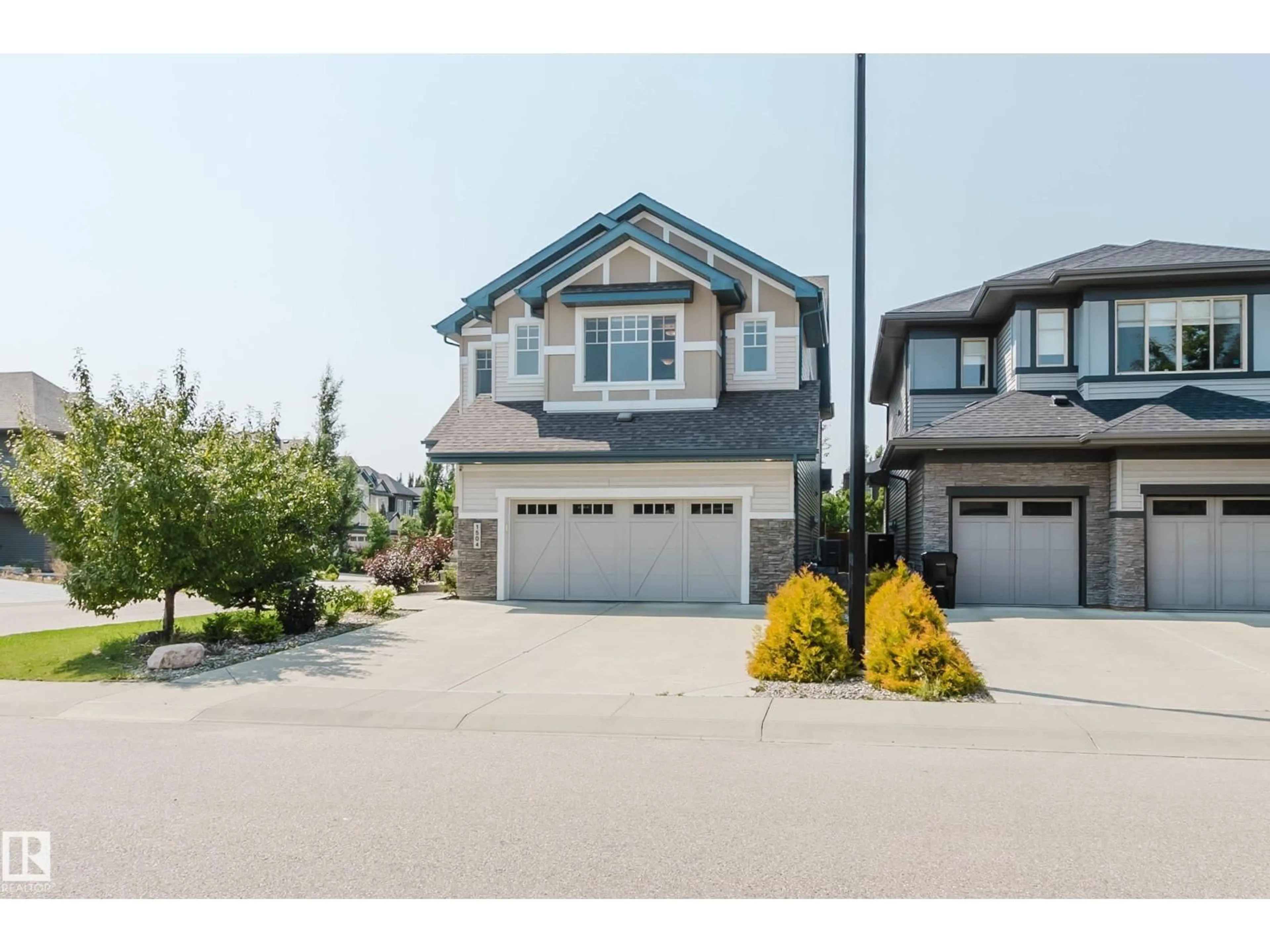 Home with vinyl exterior material, street for 1504 AINSLIE PL, Edmonton Alberta T6W3E9