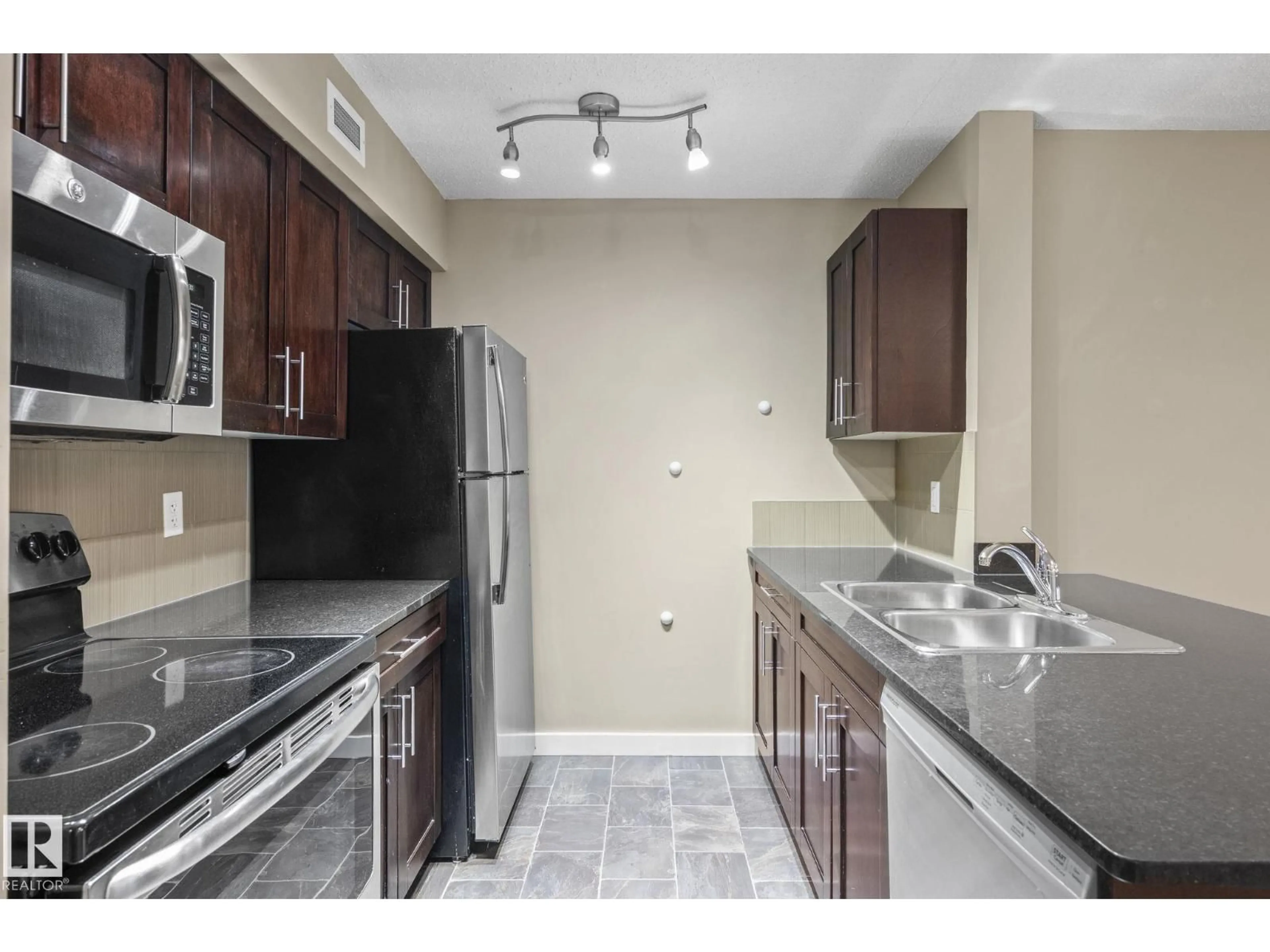 Standard kitchen, unknown for #116 - 12025 22 AV, Edmonton Alberta T6W2Y1