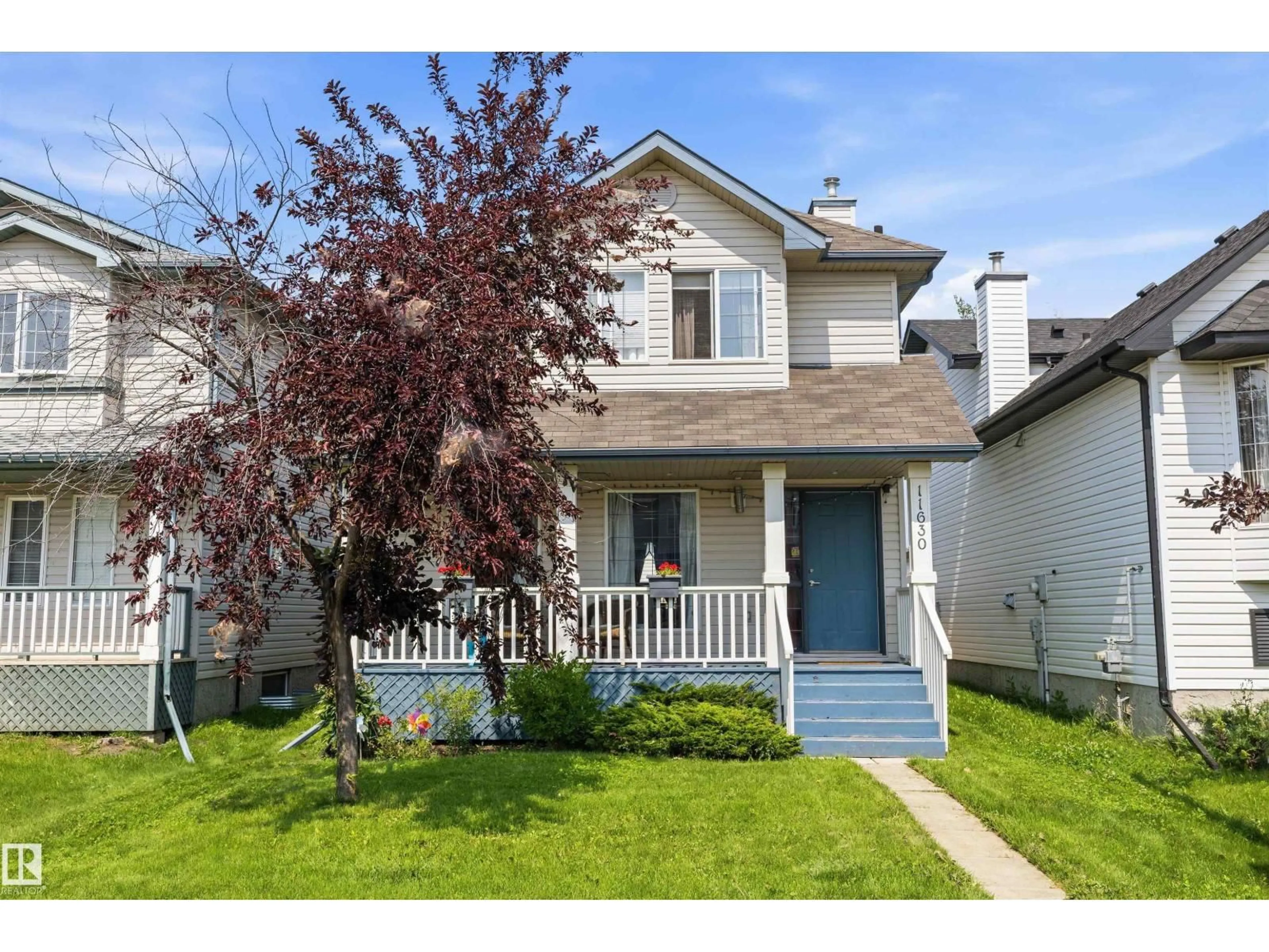 Home with vinyl exterior material, street for 11630 167B AV, Edmonton Alberta T5X6B7