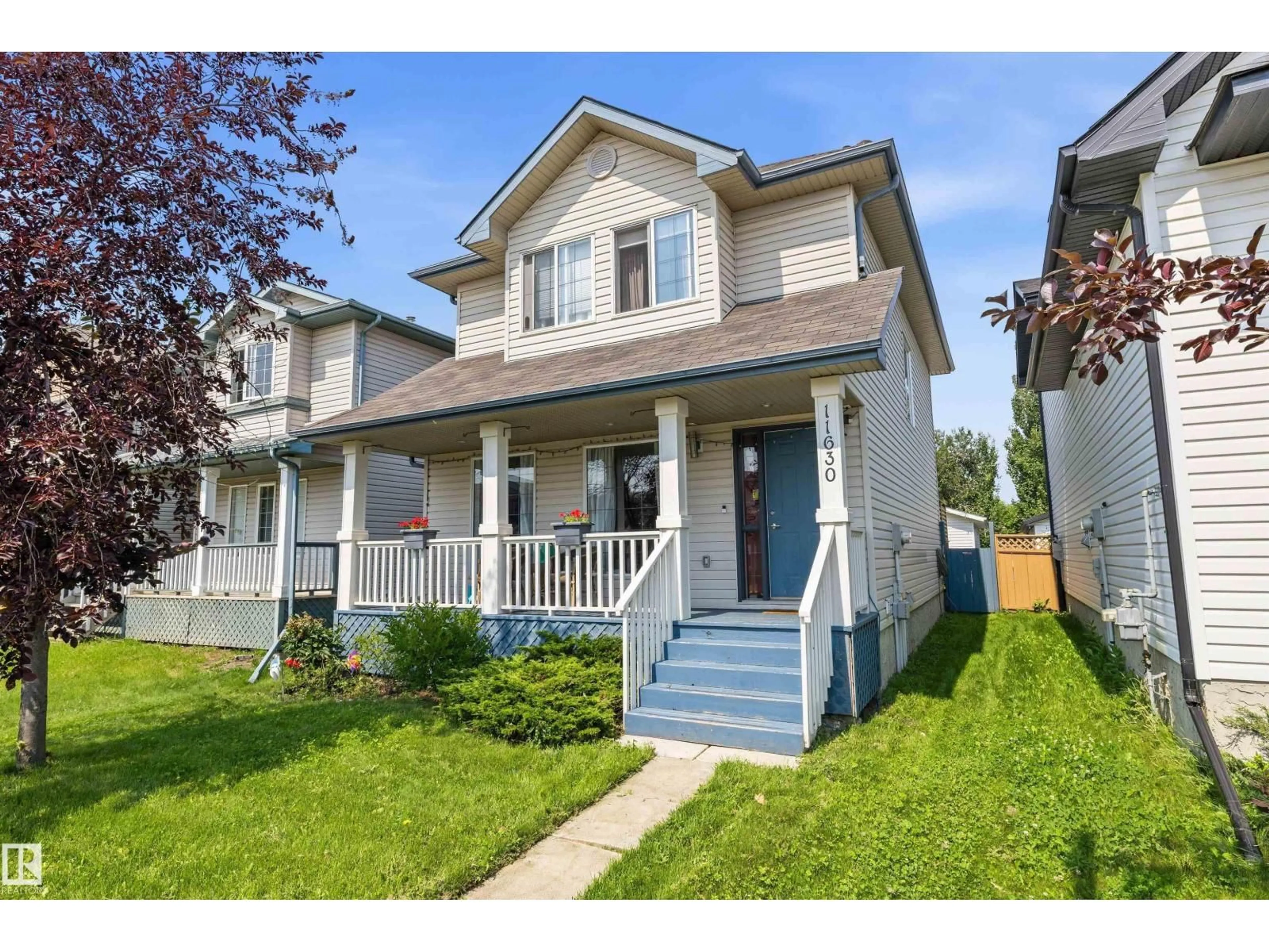 Home with vinyl exterior material, street for 11630 167B AV, Edmonton Alberta T5X6B7