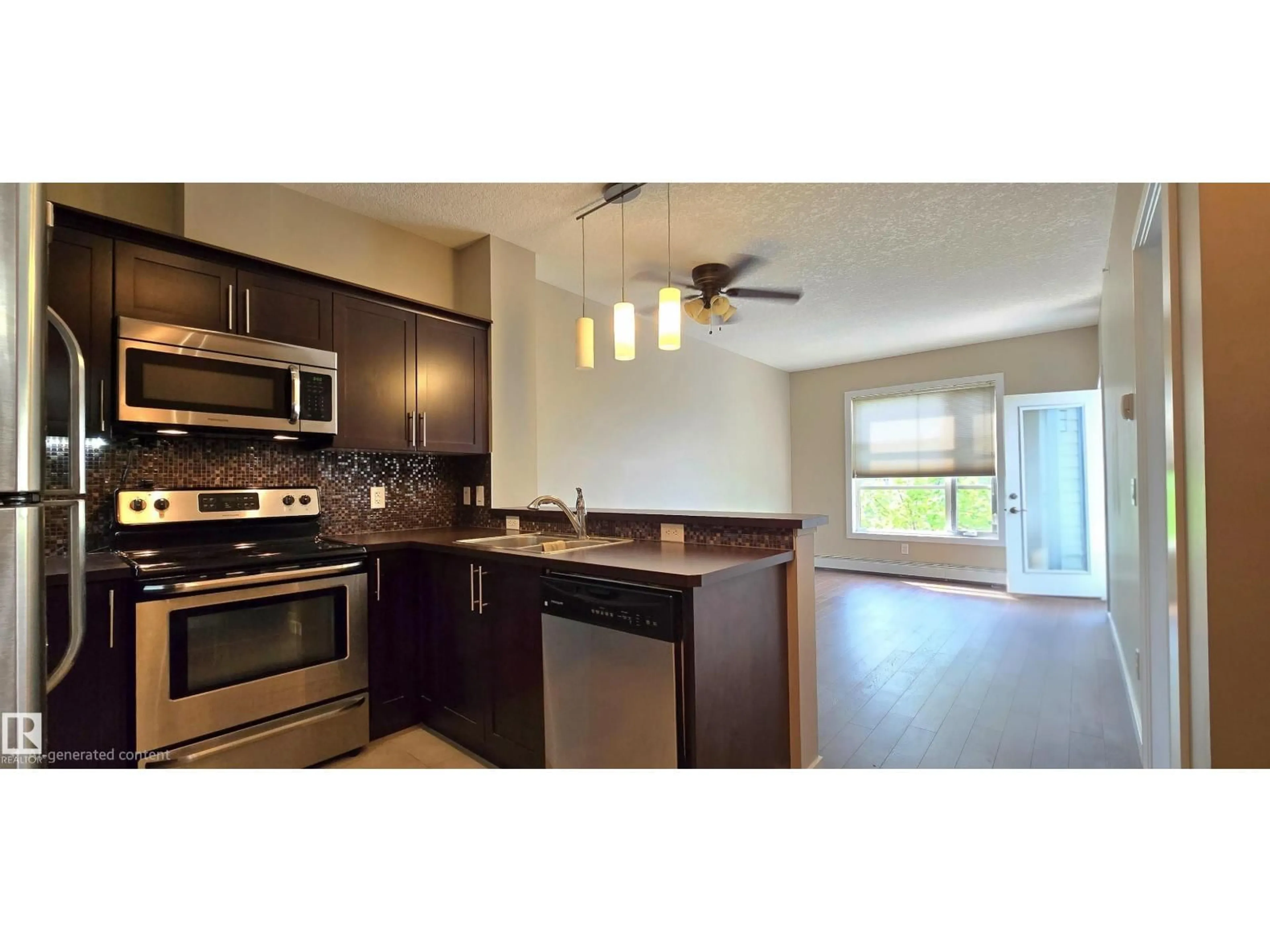 Open concept kitchen, wood/laminate floor for 2584 ANDERSON WY, Edmonton Alberta T6W0R2