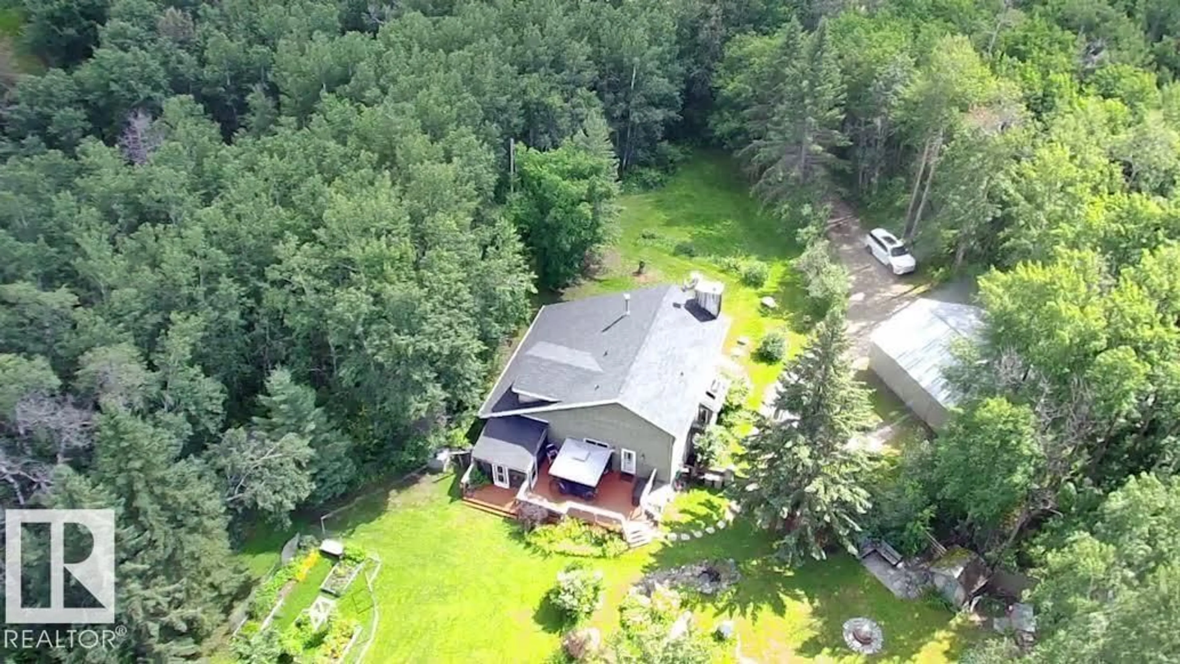 A pic from outside/outdoor area/front of a property/back of a property/a pic from drone, forest/trees view for 109 - 50514 RGE RD 202, Rural Beaver County Alberta T0B4J2