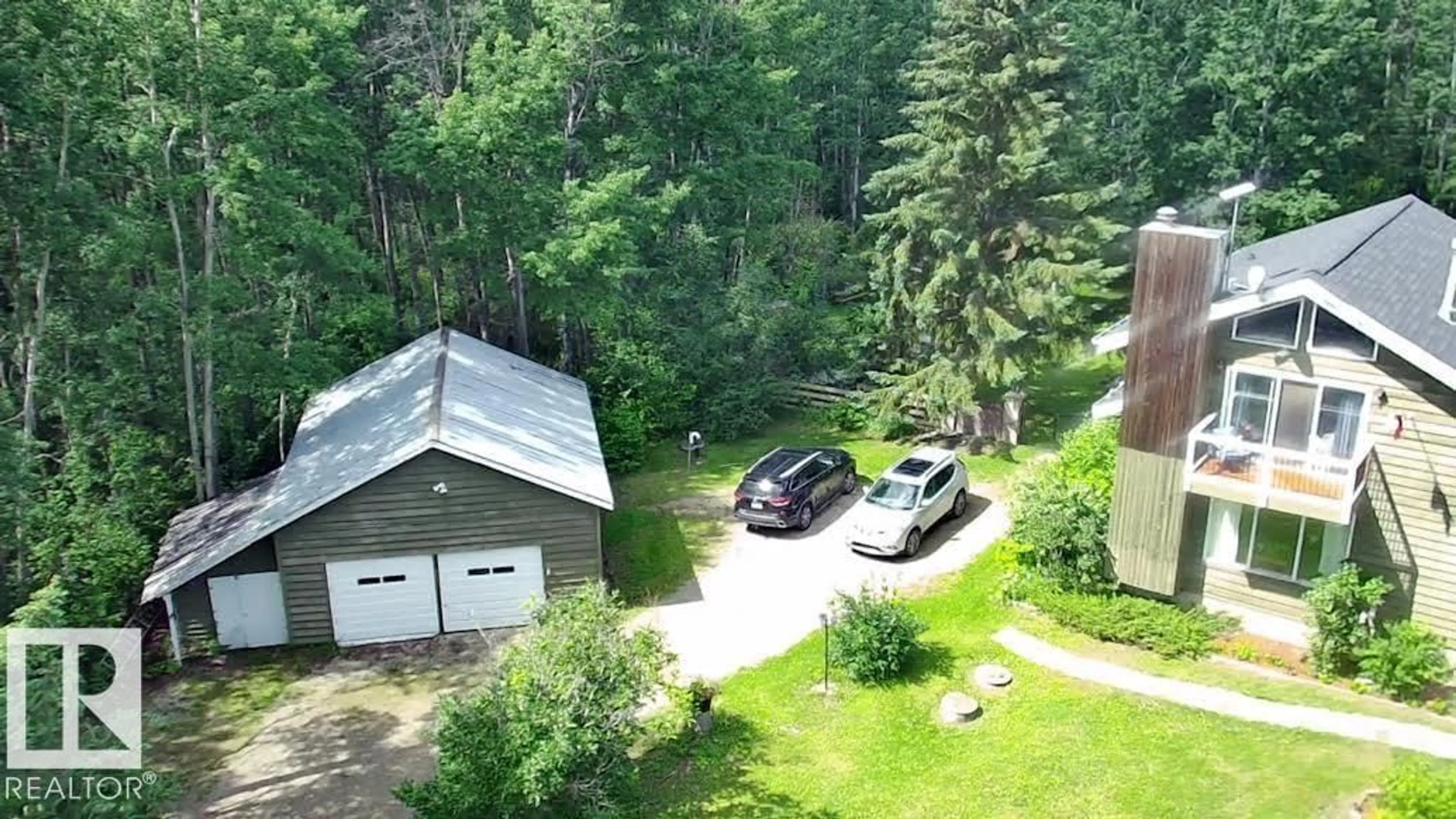 A pic from outside/outdoor area/front of a property/back of a property/a pic from drone, forest/trees view for 109 - 50514 RGE RD 202, Rural Beaver County Alberta T0B4J2